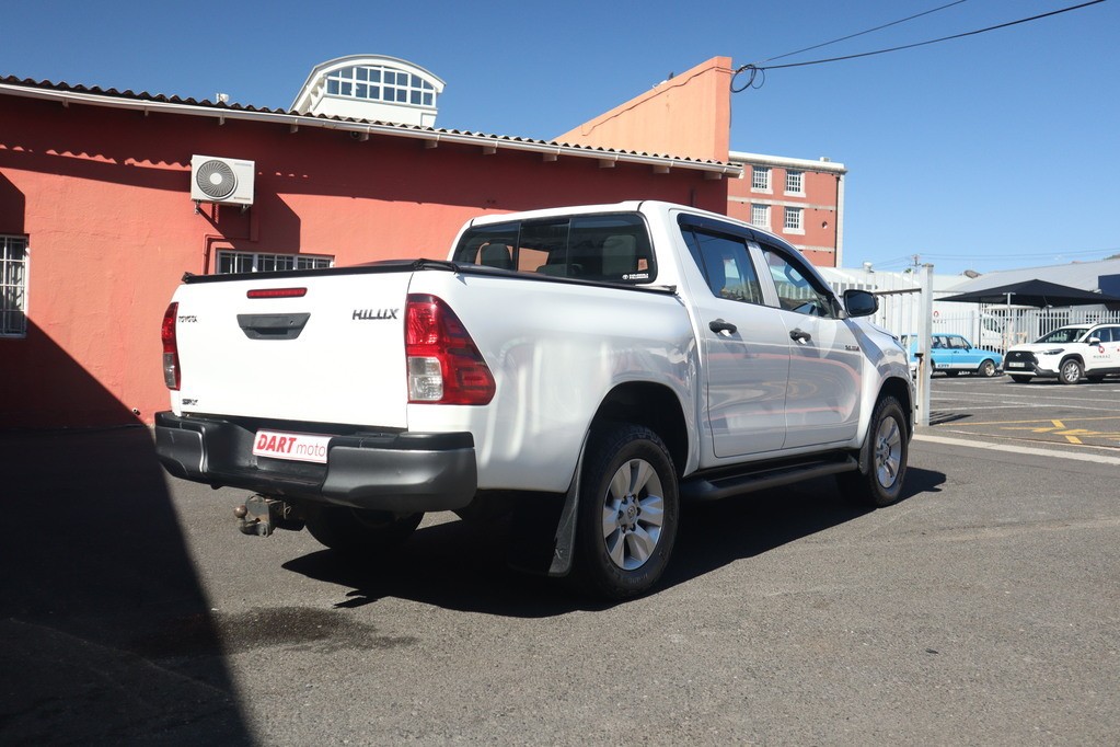 man in white crew neck shirt wearing black framed eyeglasses