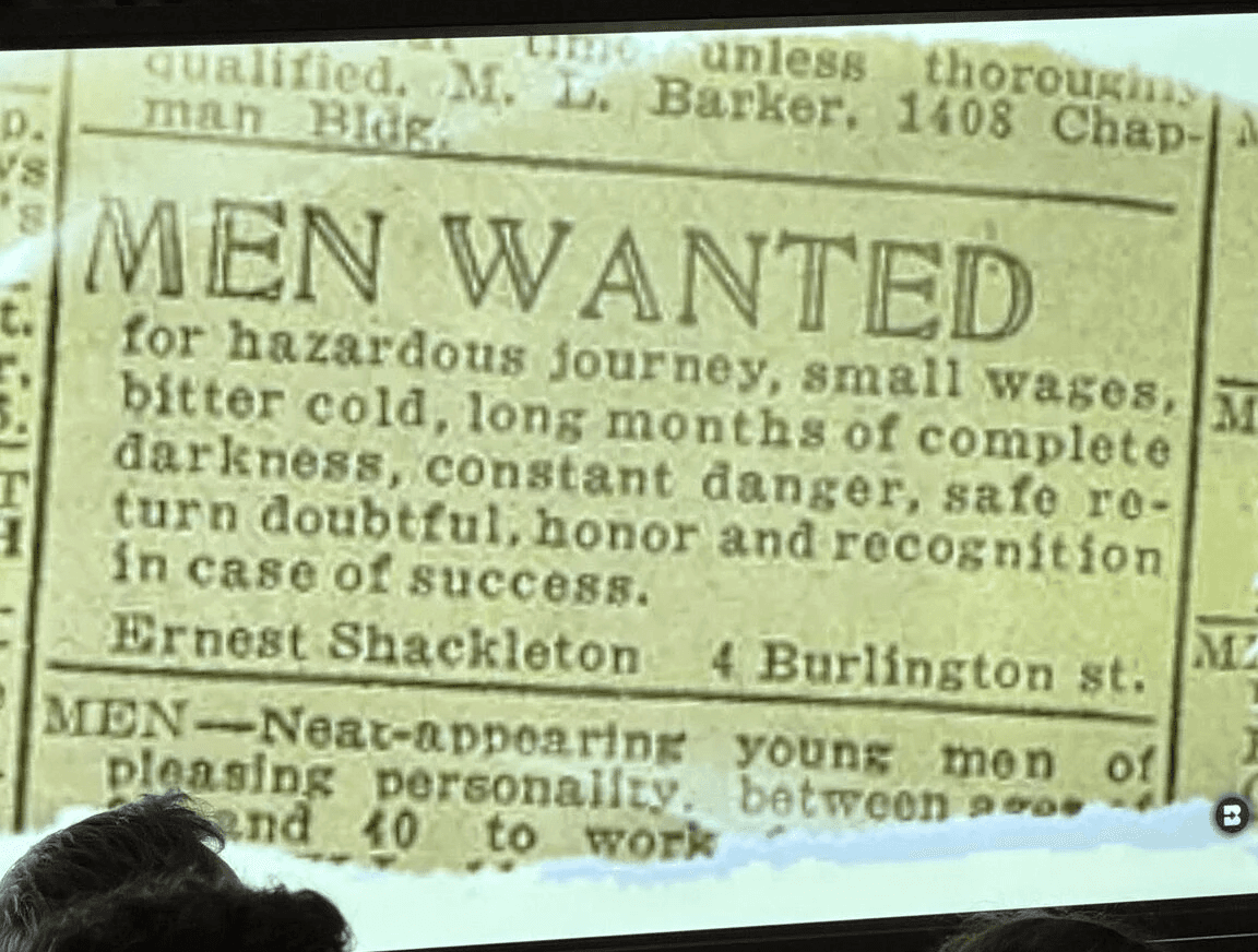 Historic newspaper advertisement for hazardous Antarctic expedition work, shown during a presentation.
