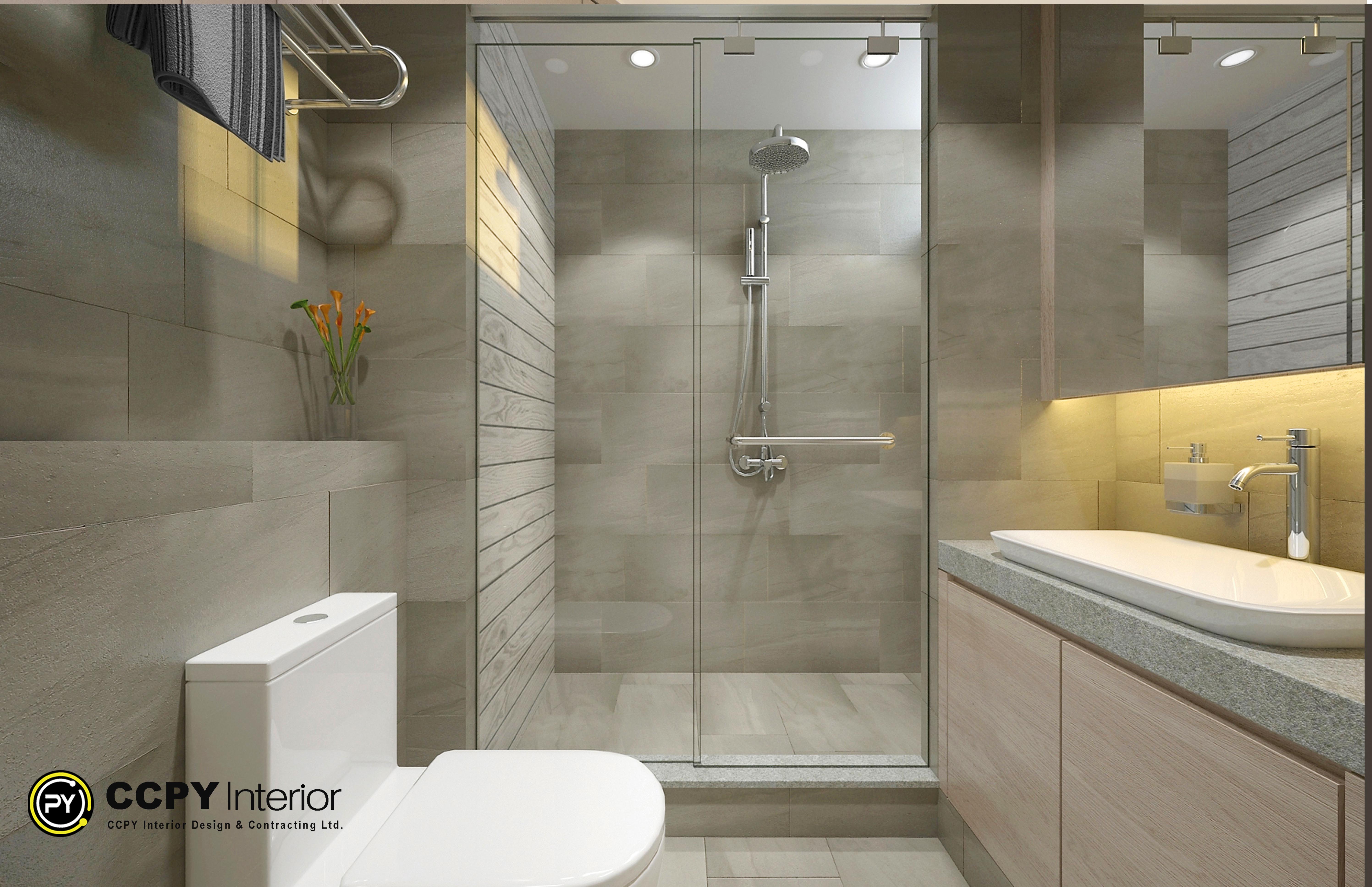 Key Design FeaturesGlass Shower Enclosure: Seamless sliding glass panels optimize the compact layout without blocking light.Floating Vanity: A light wood-grained counter with an integrated wide trough sink saves floor space.Textured Wall Tiling: Alternating beige and wood-look horizontal tiles add warmth and depth to the wet area.Recessed Lighting: Warm LED strip lighting under the mirror cabinet creates a soft, ambient glow.Compact Fixtures: Modern minimalist shower hardware and a low-profile toilet fit comfortably within the narrow footprint.
