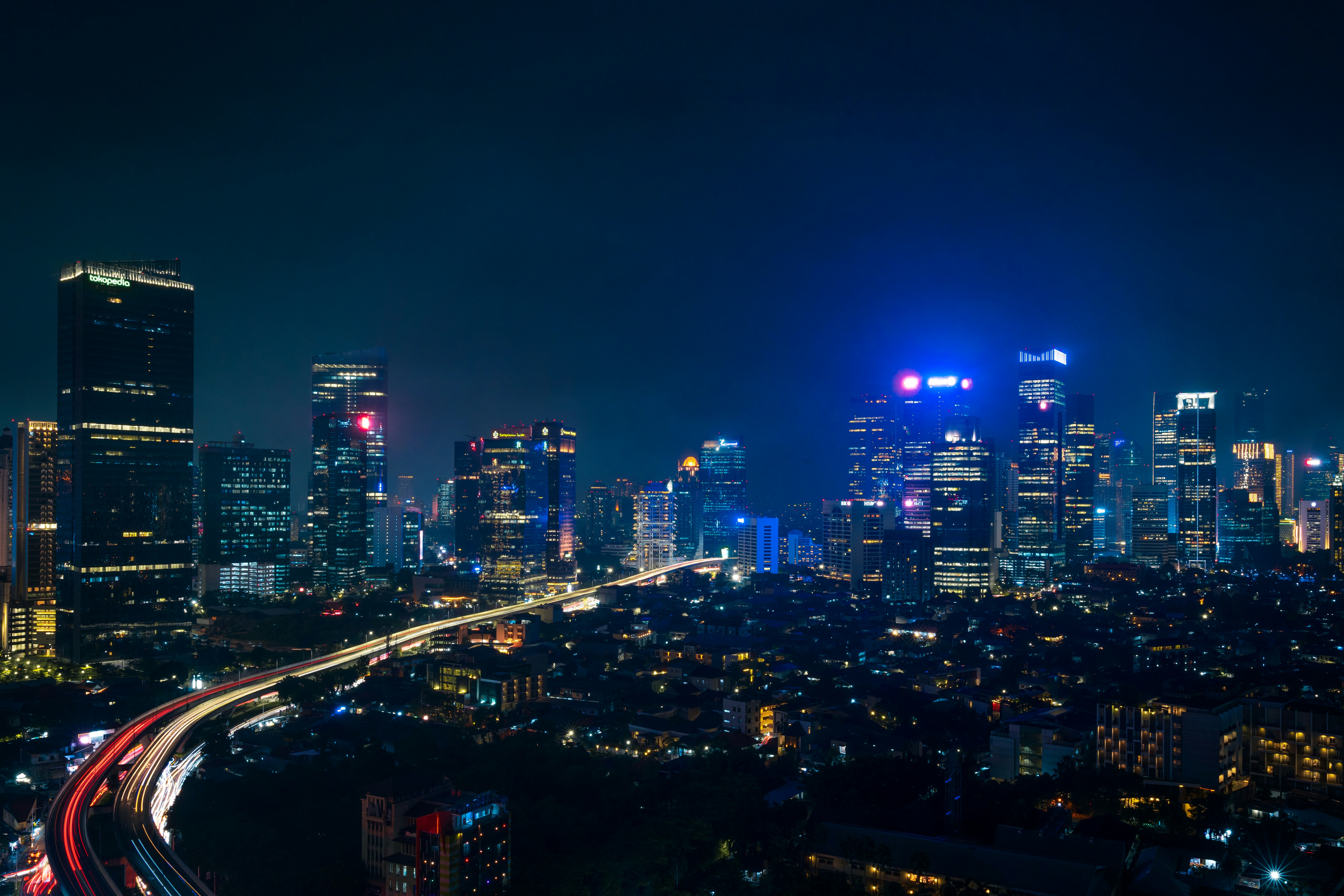 The Jakarta skyline at night, where MixWork places software engineers on Indonesian employment contracts