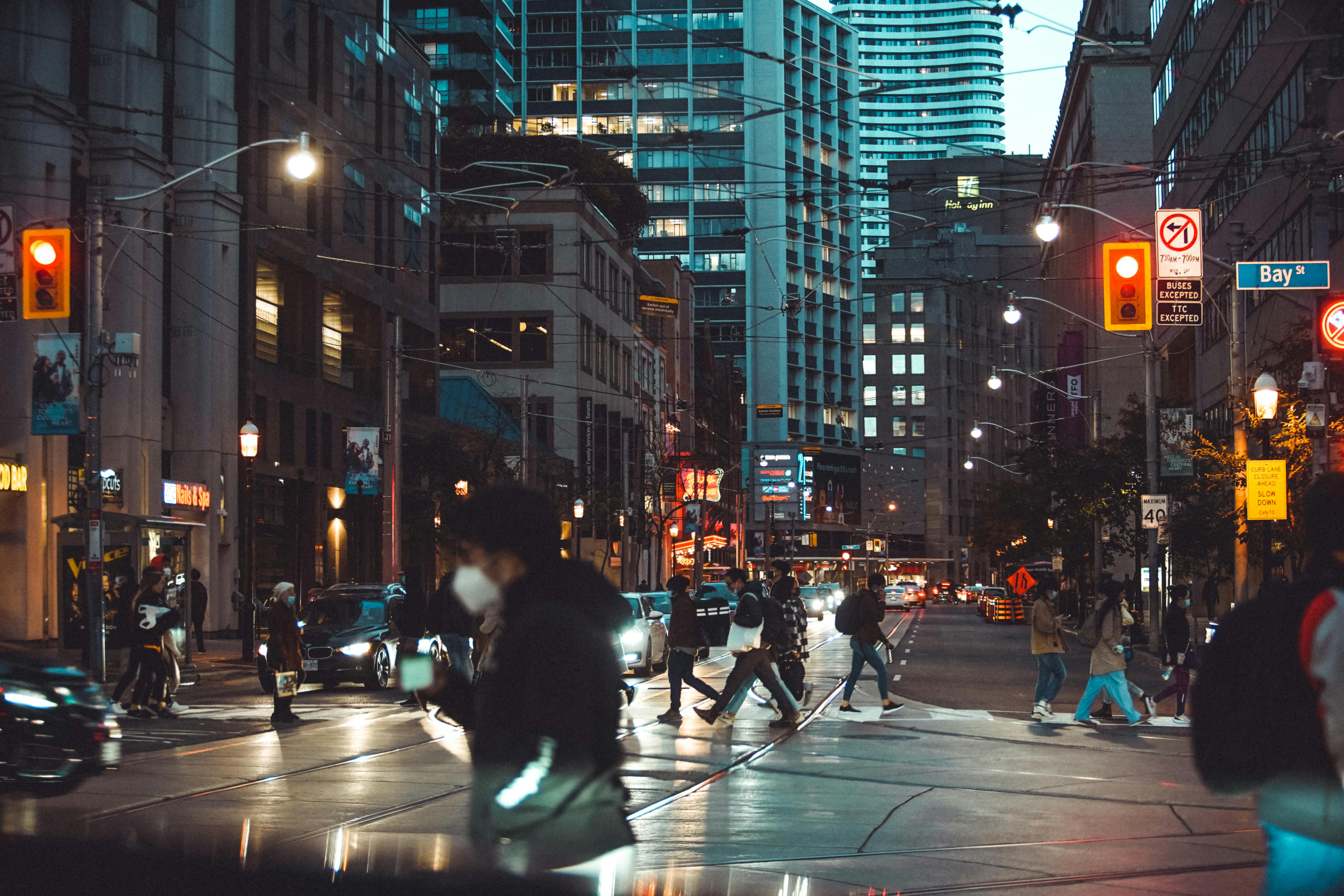 people walking in a downtown street