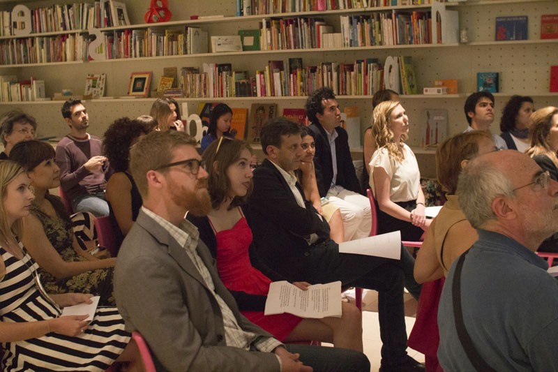 well dressed audience listening