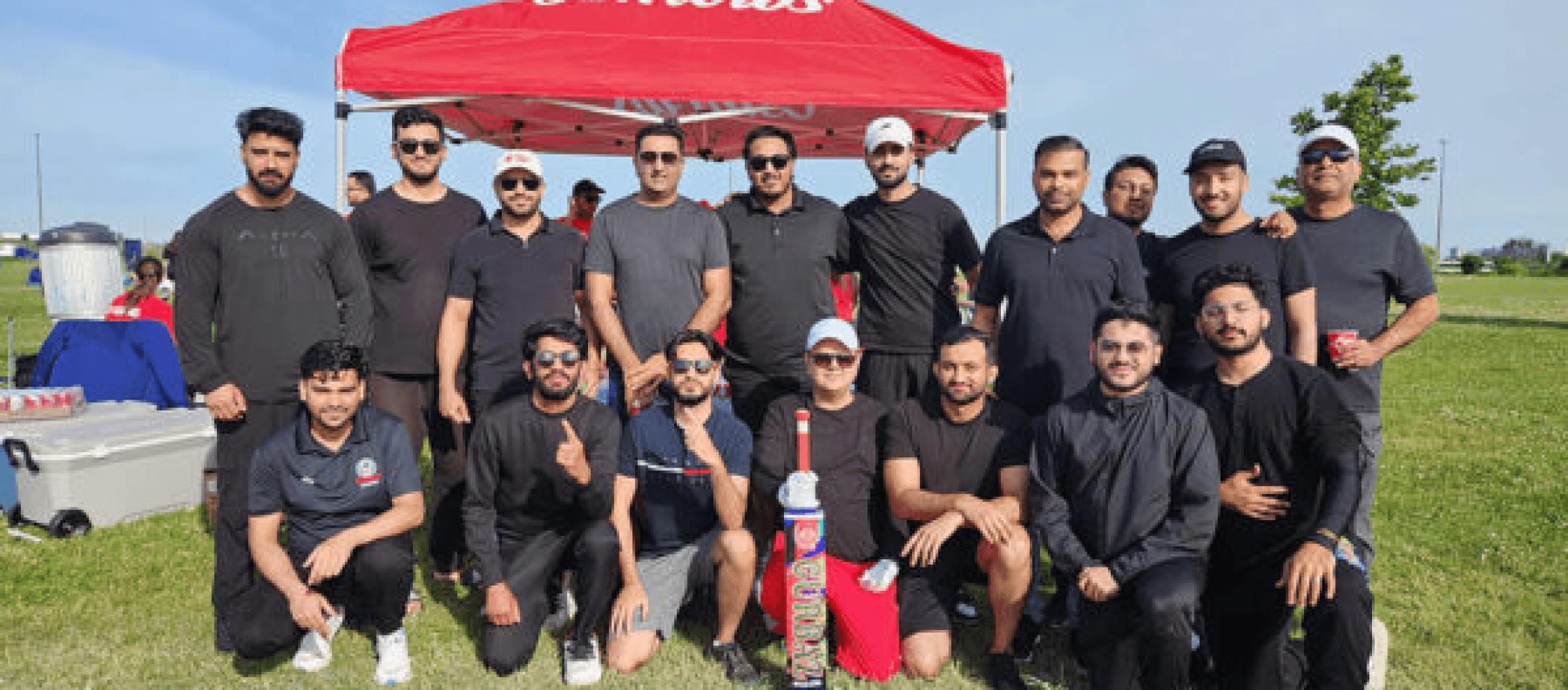 Osmow's annual charity cricket tournament team photo supporting the Hope Fund
