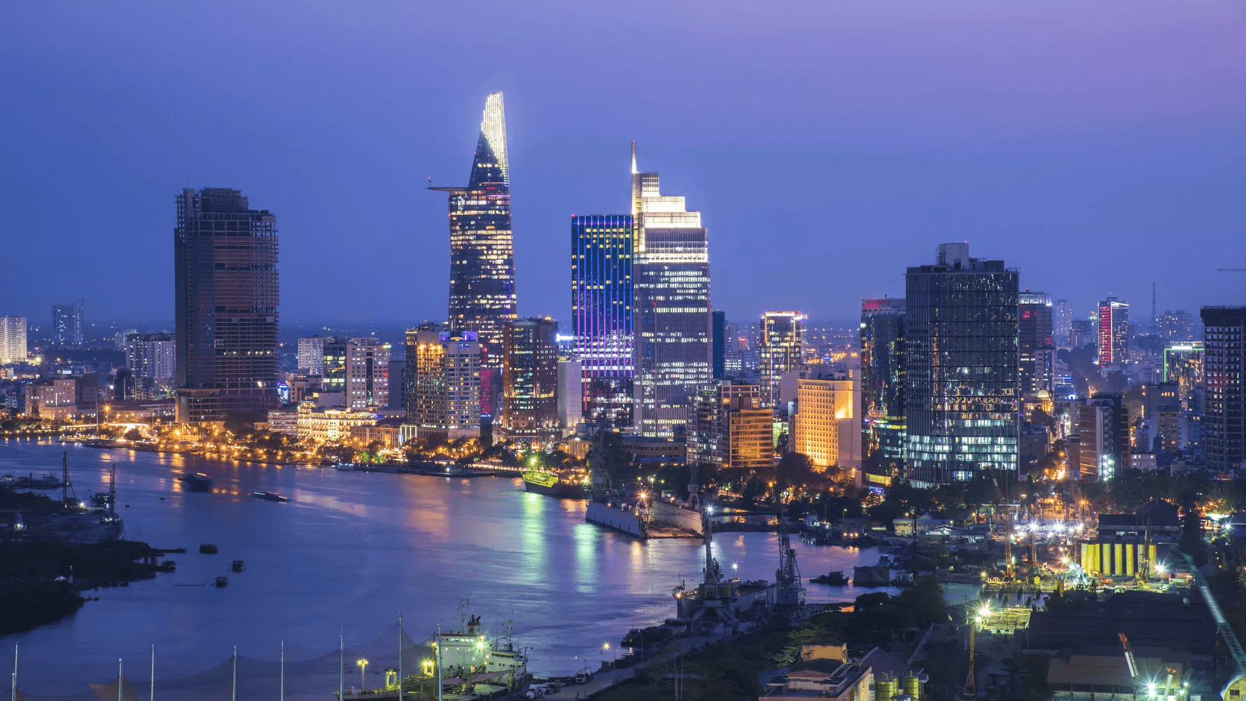 This image shows a scenic view of the Ho Chi Minh City skyline at sunset