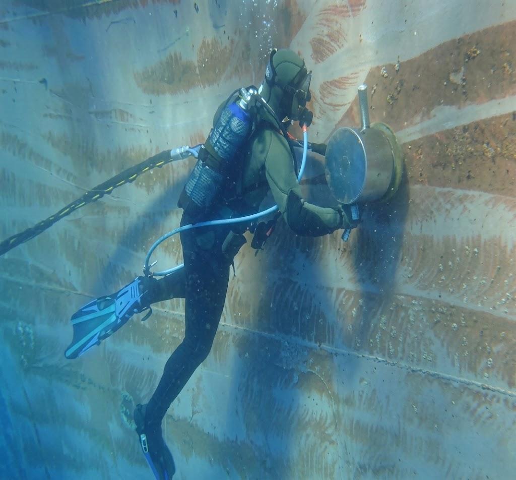 Historical profile image of an underwater hull cleaning operation.