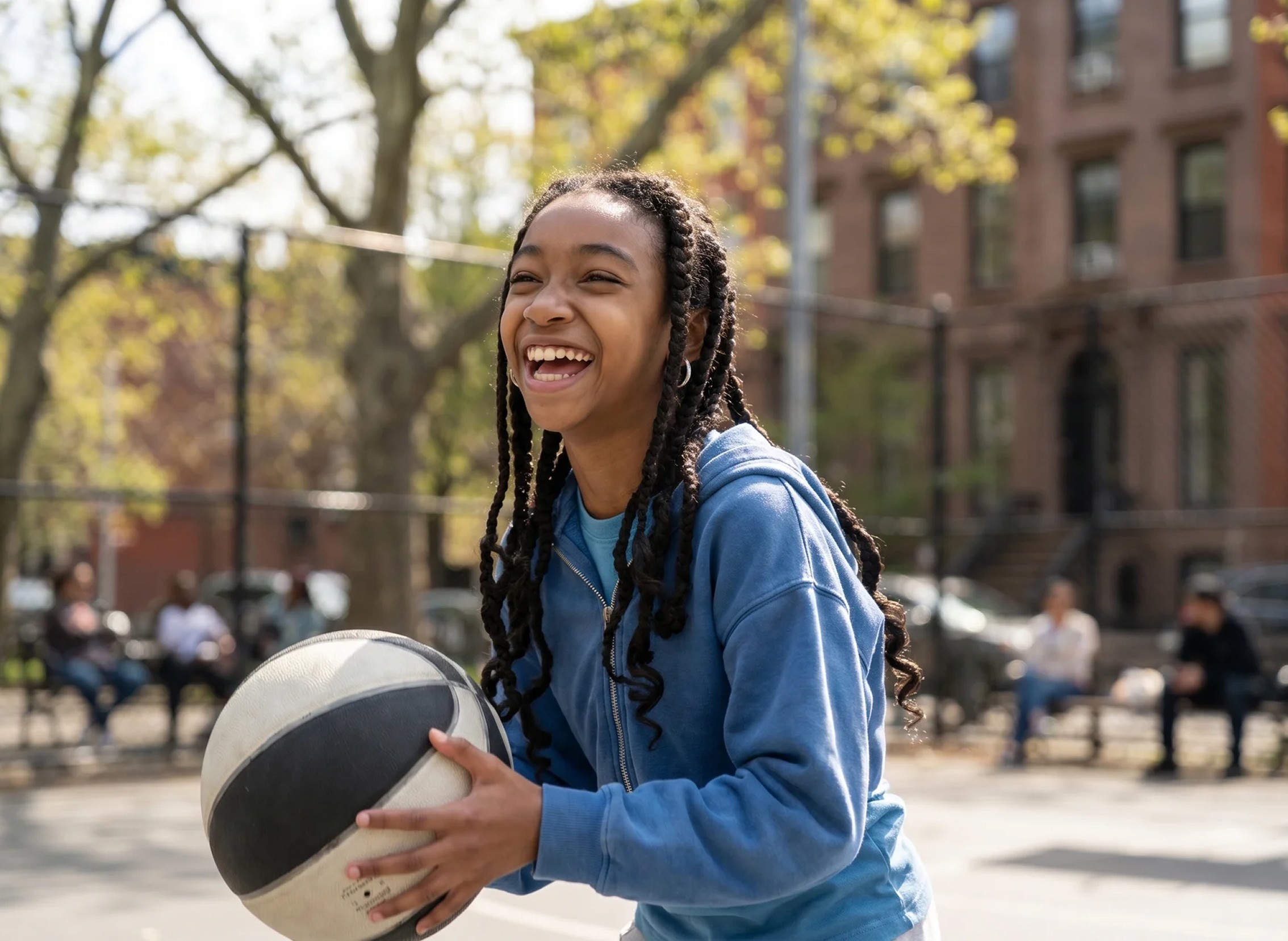 young girl playing basketball in new york