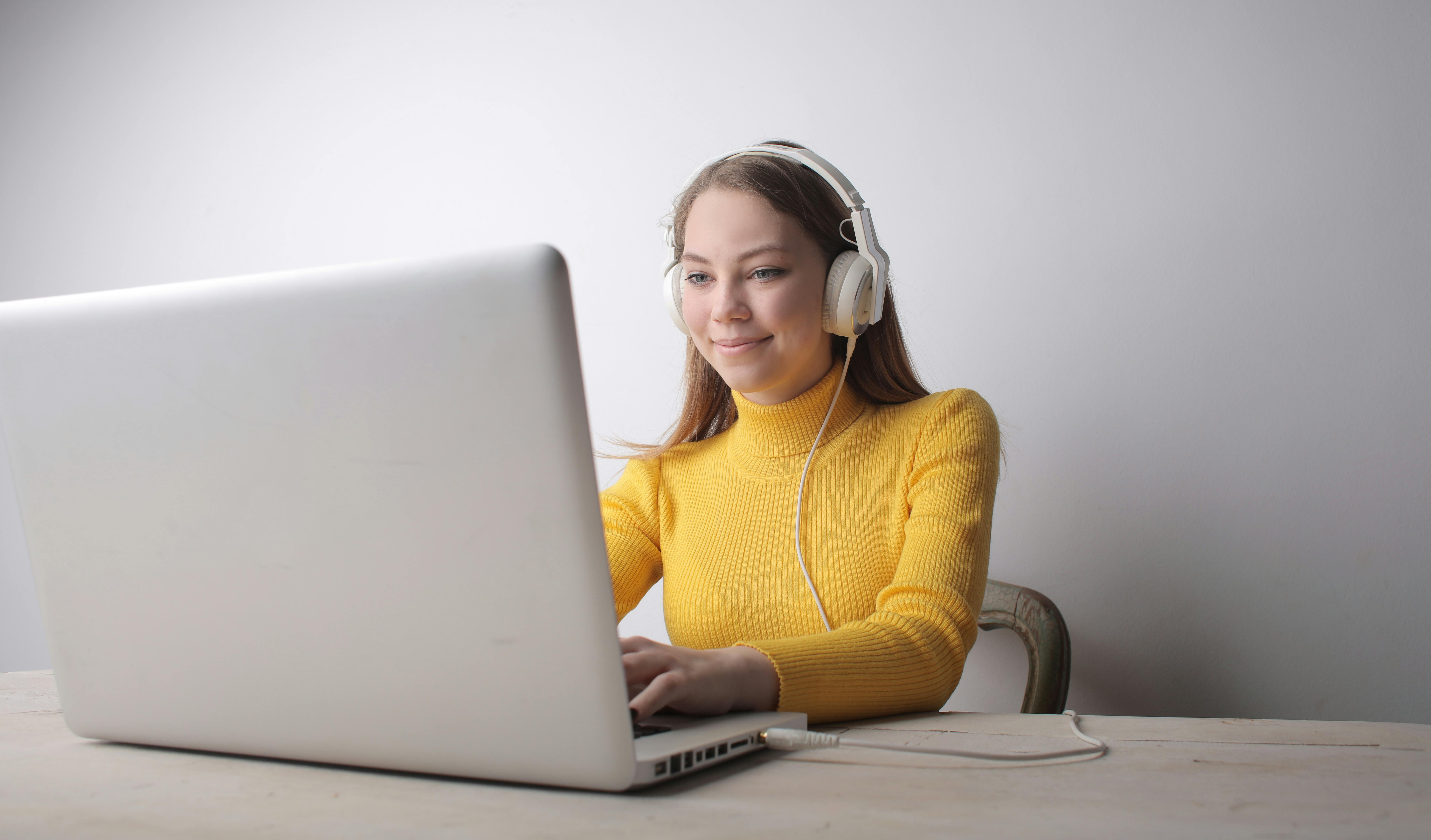 Woman doing cold email campaign using laptop