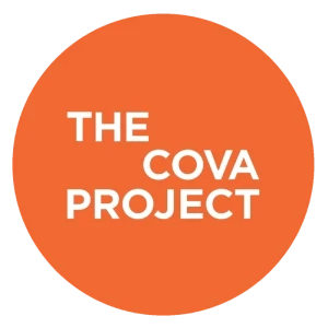 The image features an orange circle with the white text "THE COVA PROJECT" centered inside, emphasizing the logo design.