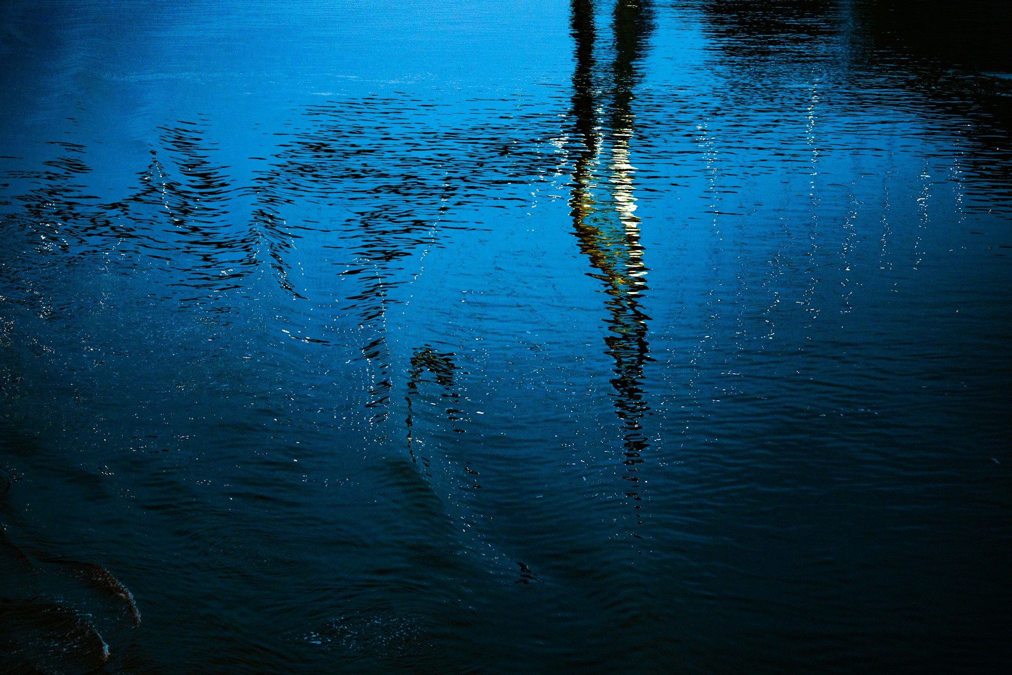 Calm river water at dusk