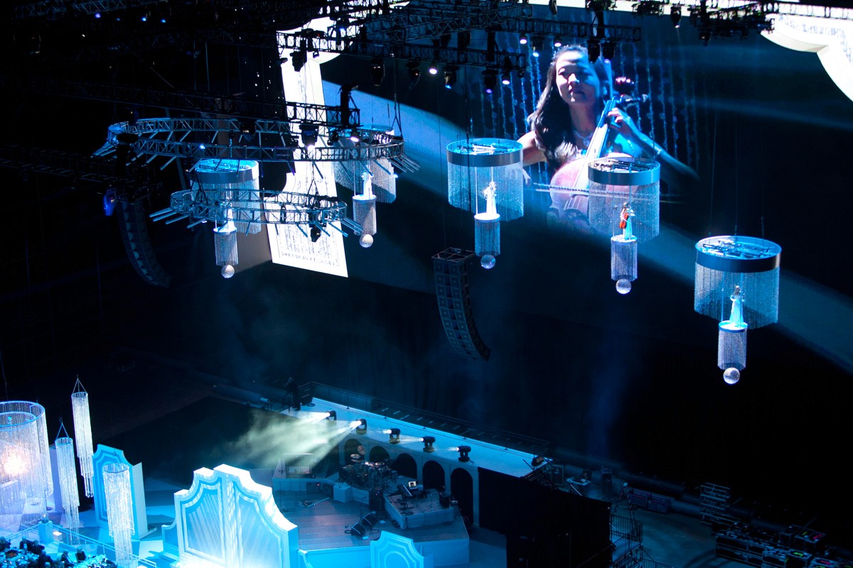 human orchestra lanterns suspended from the ceiling at ATT Stadium