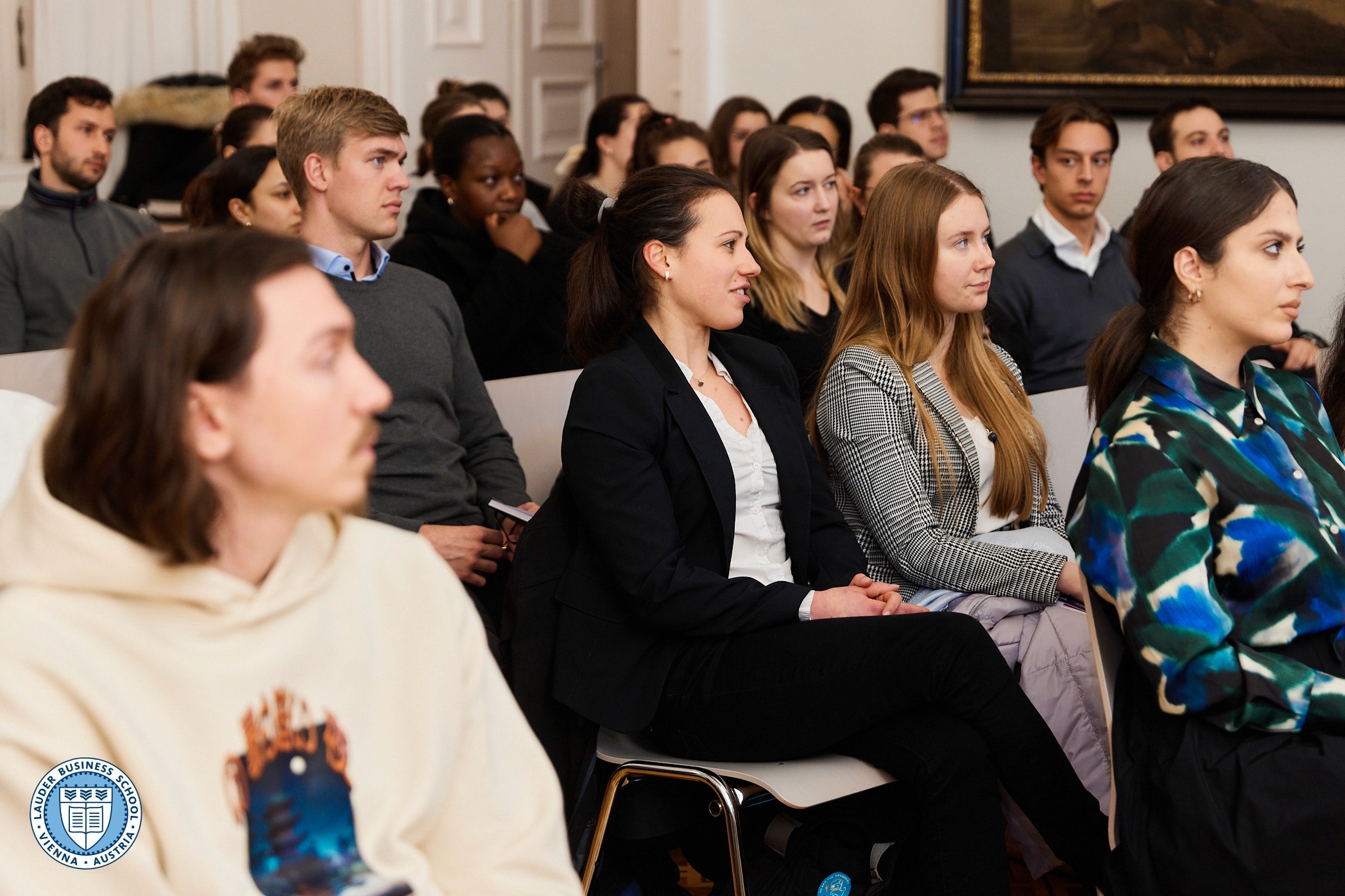 LBS students interacting with  Adam Lessing, Ph.D., Head of Relationship Management at LGT Bank Österreich