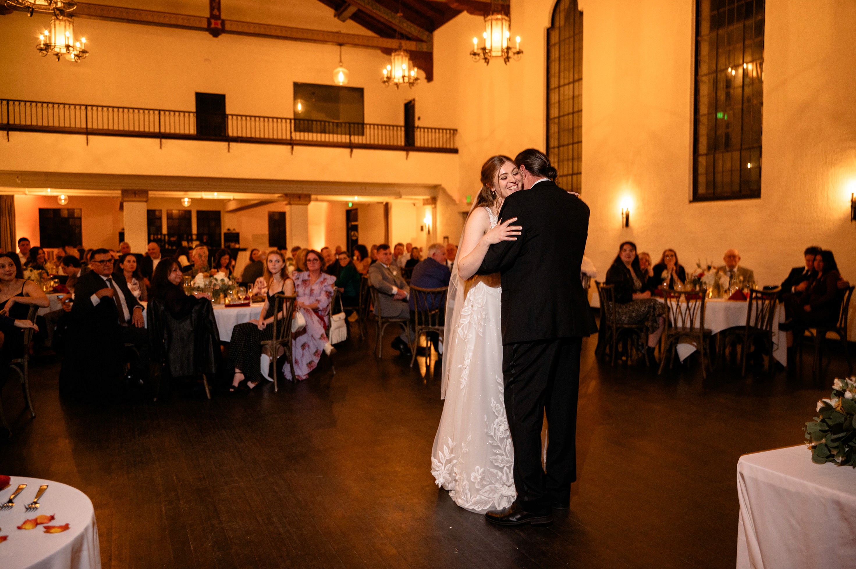 Flat lay wedding details with bouquet, rings, and sparkling bridal heels