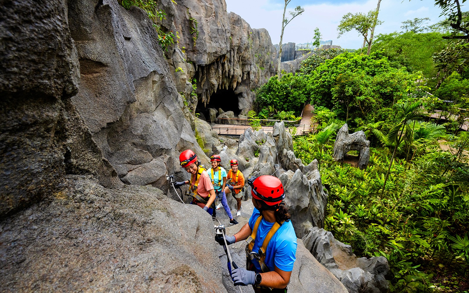 Visitors exploring Wild Cavern Adventure in Rainforest Wild ASIA, Singapore.