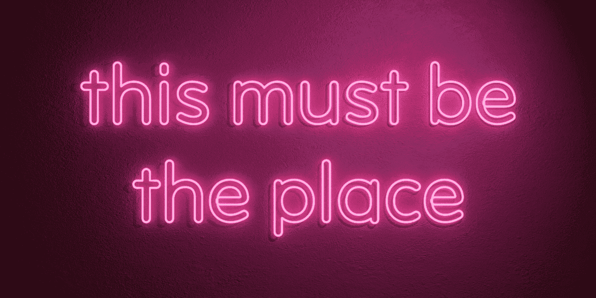 NEON SIGN saying "This must be the place"