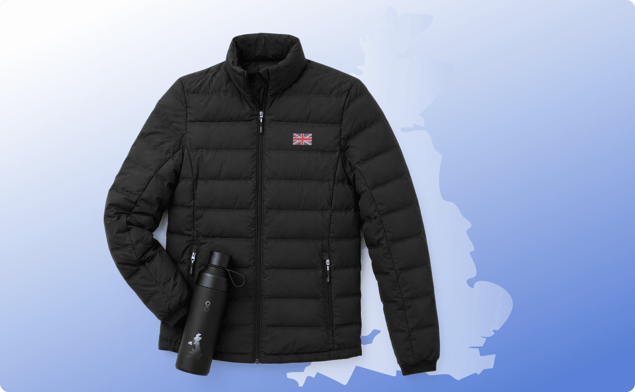 A puffer jacket and a tumbler in front of the UK map.