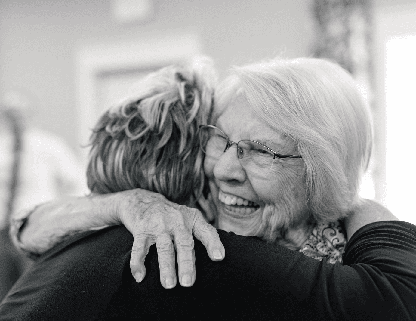 happy sisters hugging in the church in College Station