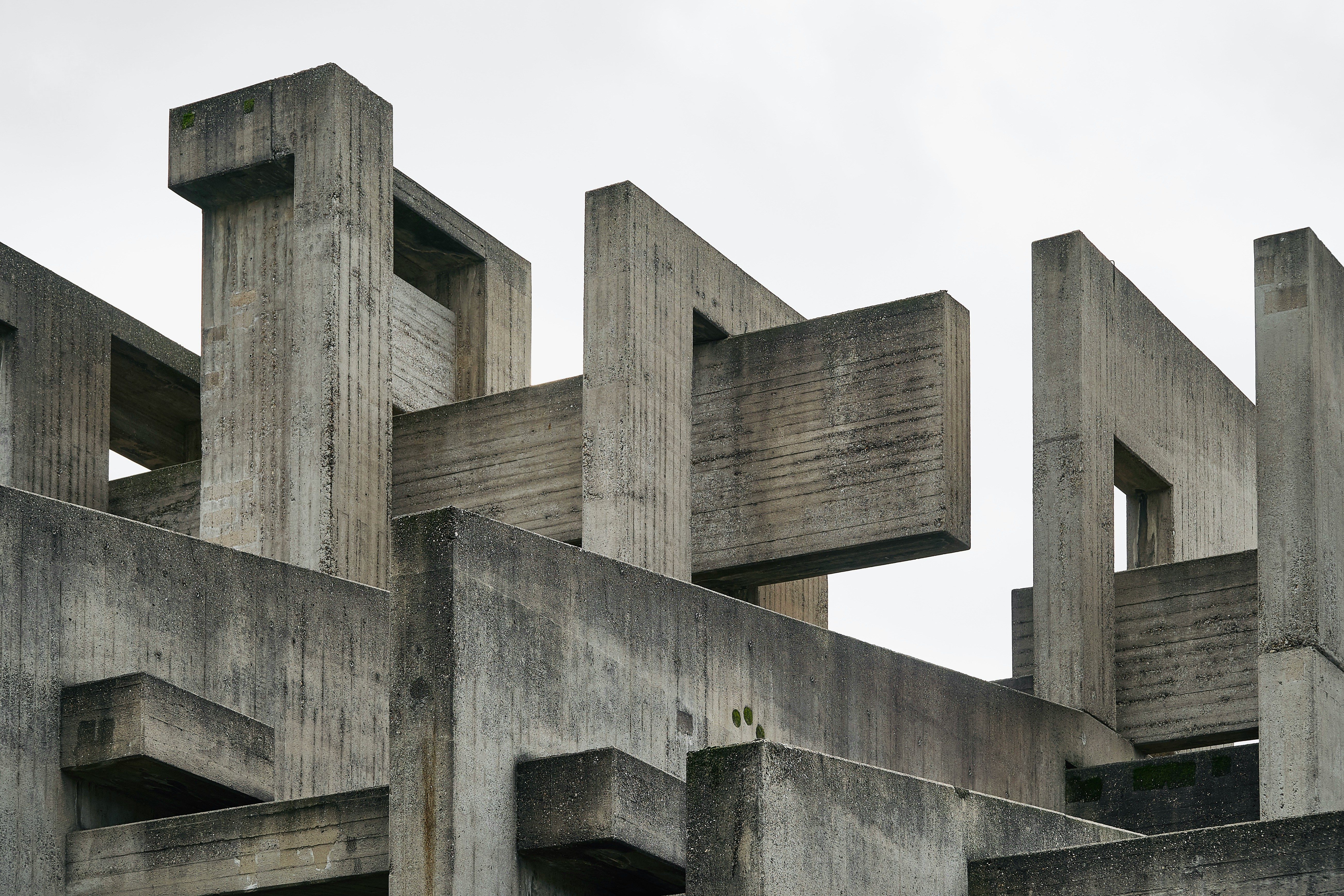 gray concrete building under white sky during daytime