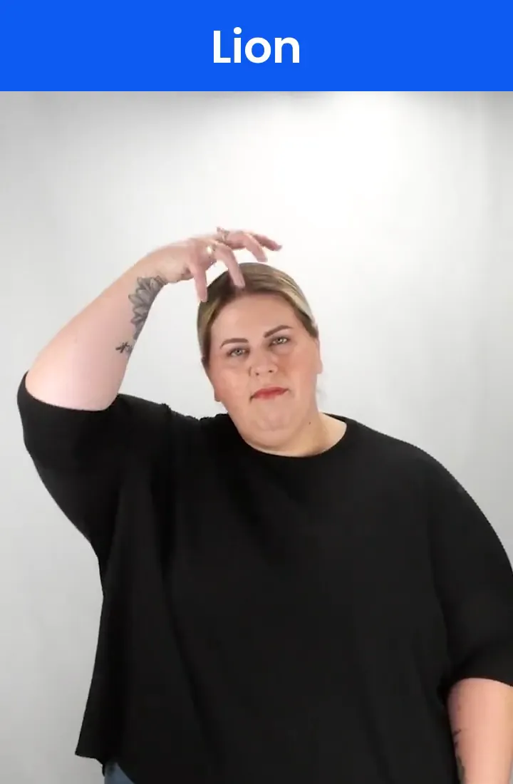 A Deaf signer signs LION in ASL