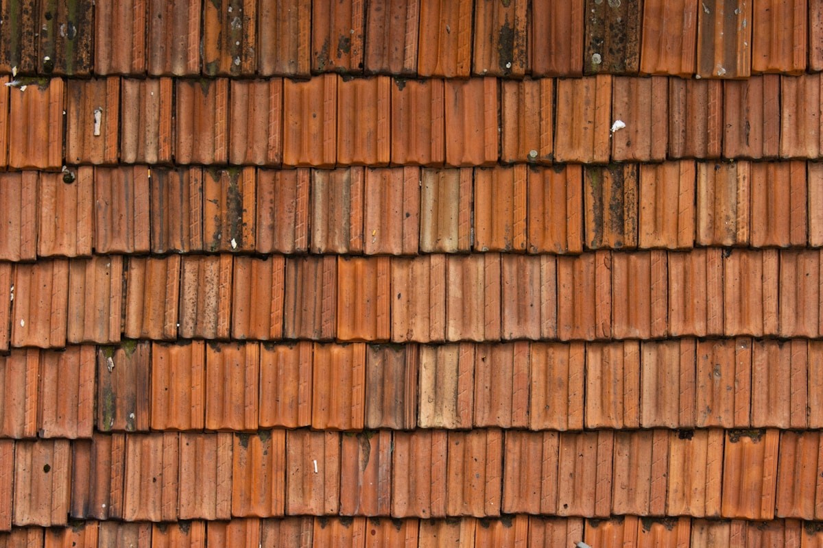 Illustrative weathered terracotta roof tiles