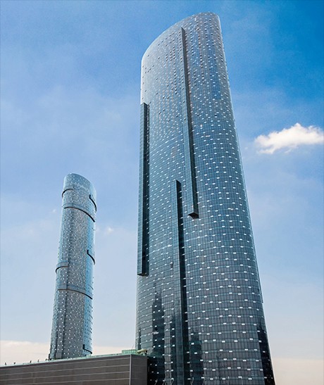Exterior of Sky Tower property near highway, ideal for clients seeking accessible luxury real estate options.