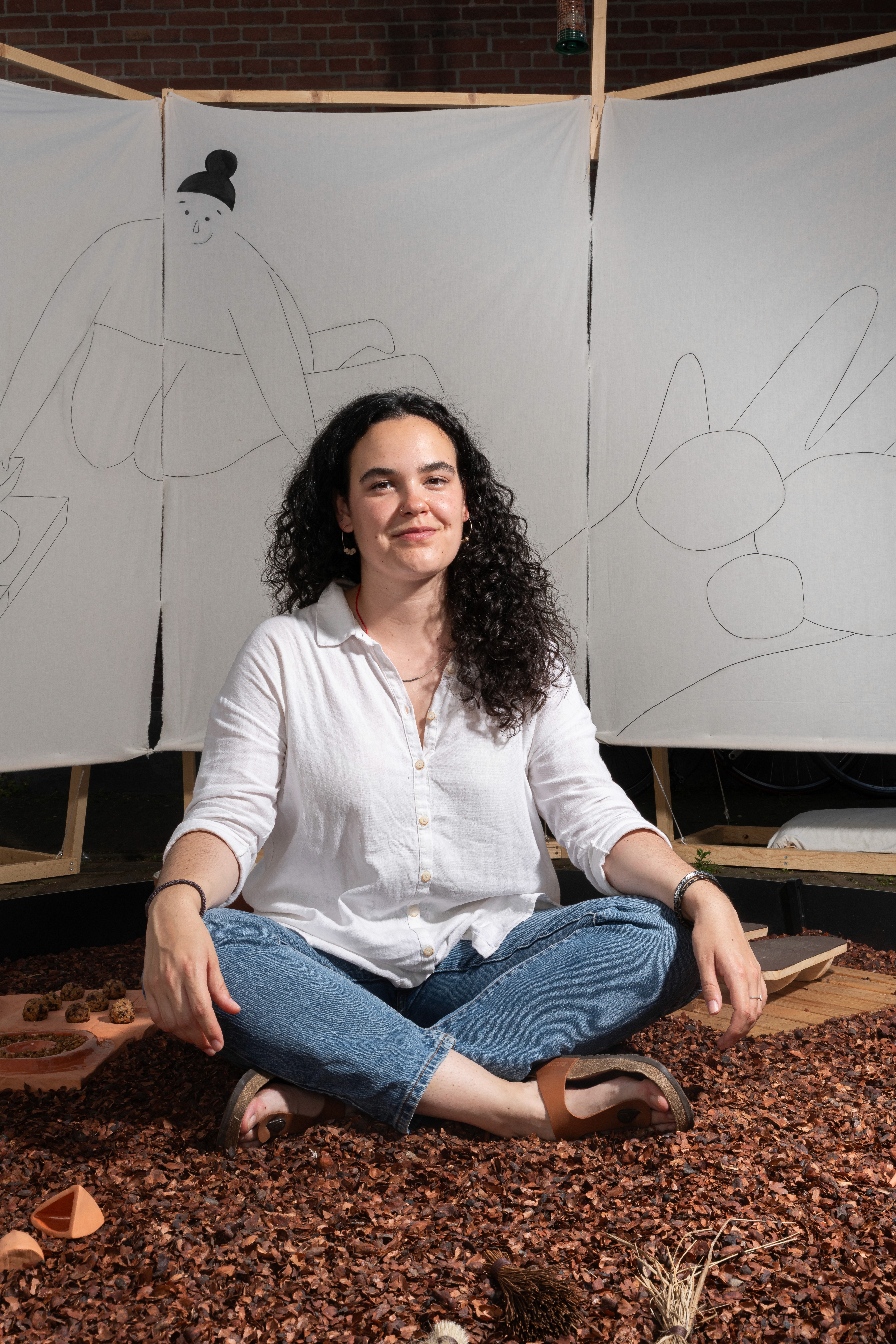 a blurry photo of a person standing in front of a wall