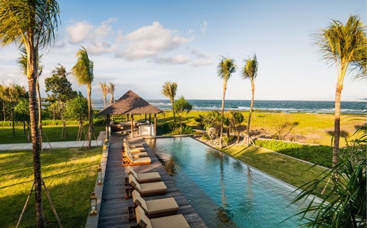 Luxury beachfront pool villa in Gianyar. Contact our real estate agents for premium Bali coastal investments.