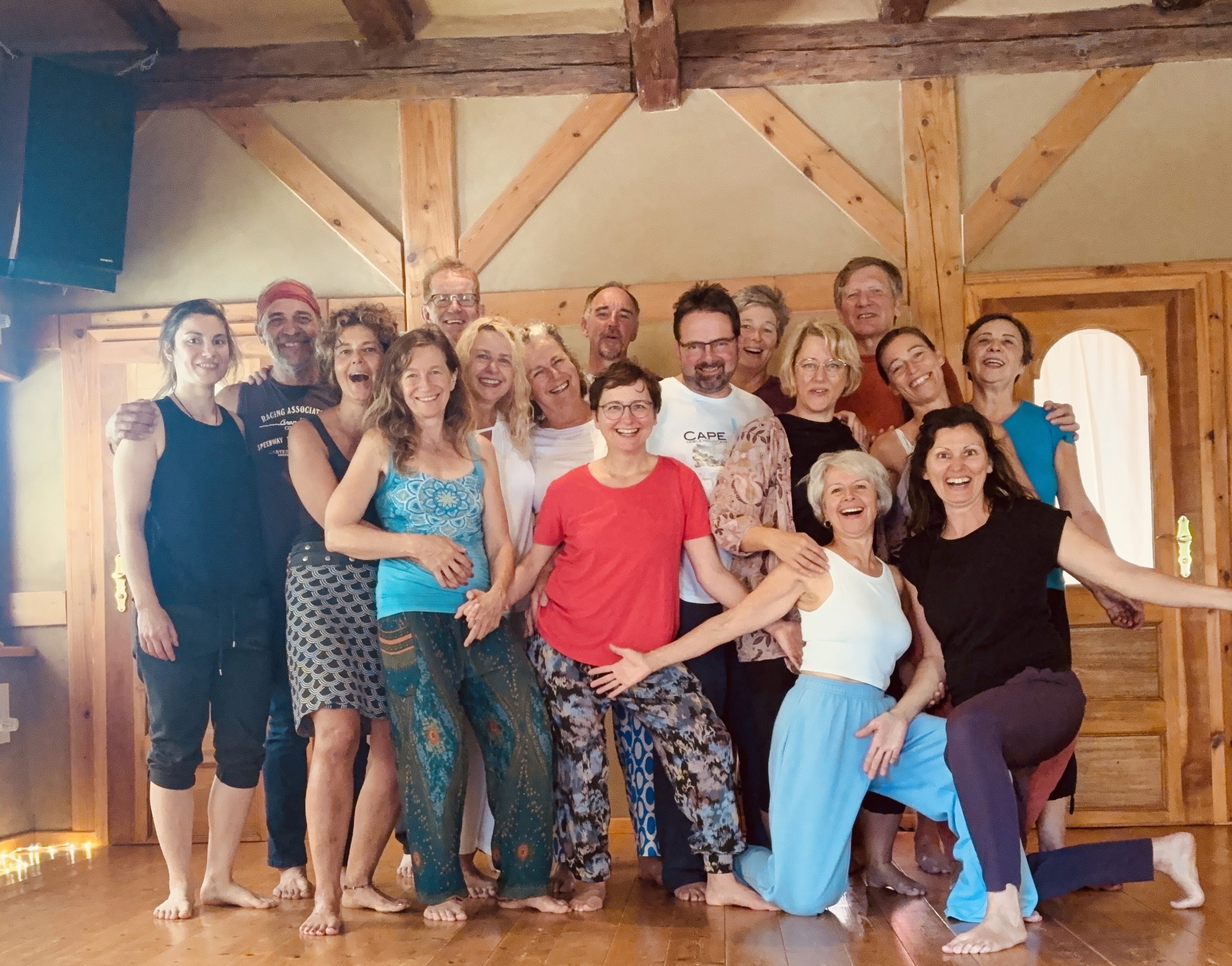 Light streams through a narrow sandstone canyon.