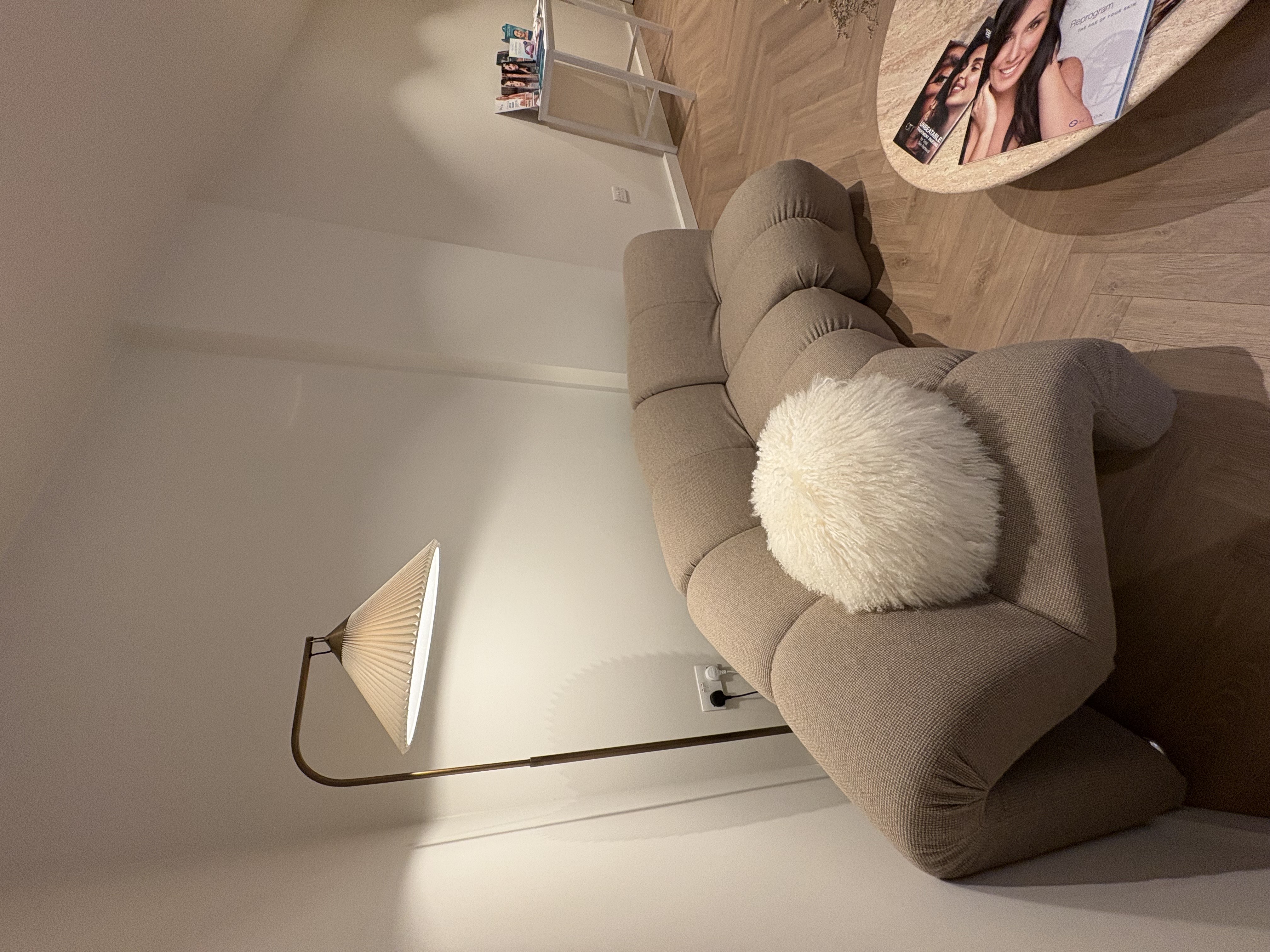 Rachel, personal trainer, looking to the side confidently in a fitness studio