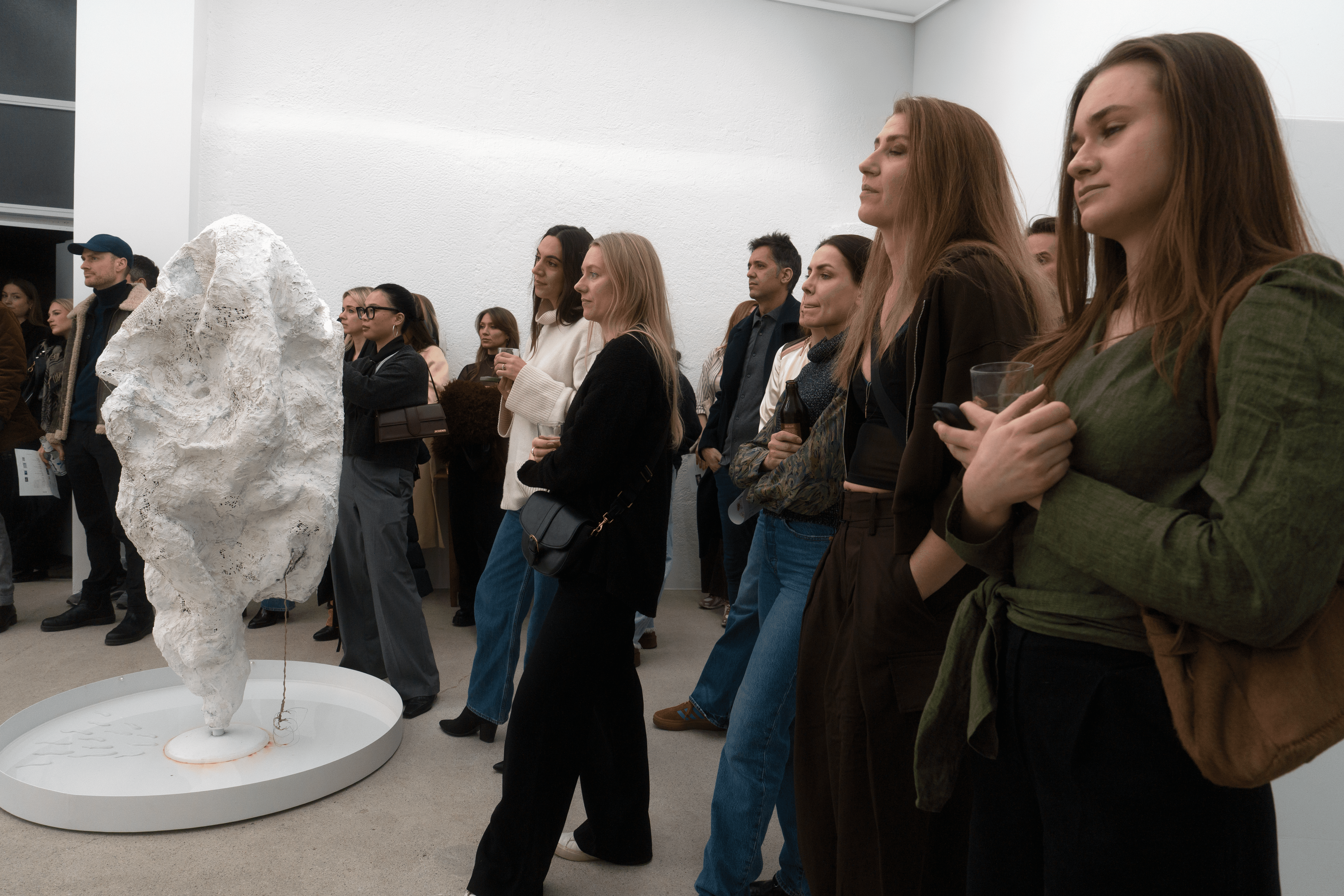 Entrepreneurs engaging in a lively discussion during a Bizz Buzz networking event.