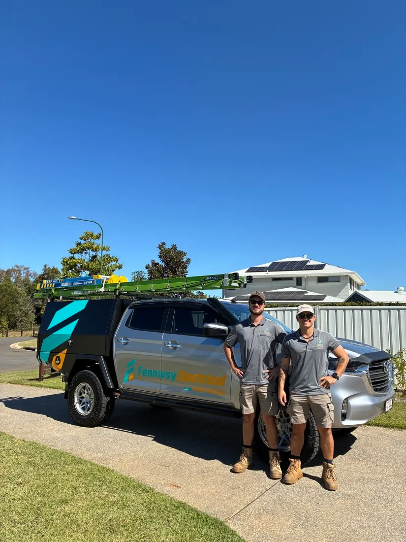 Doug and the Fennway Electrical crew with their ute in Bundaberg