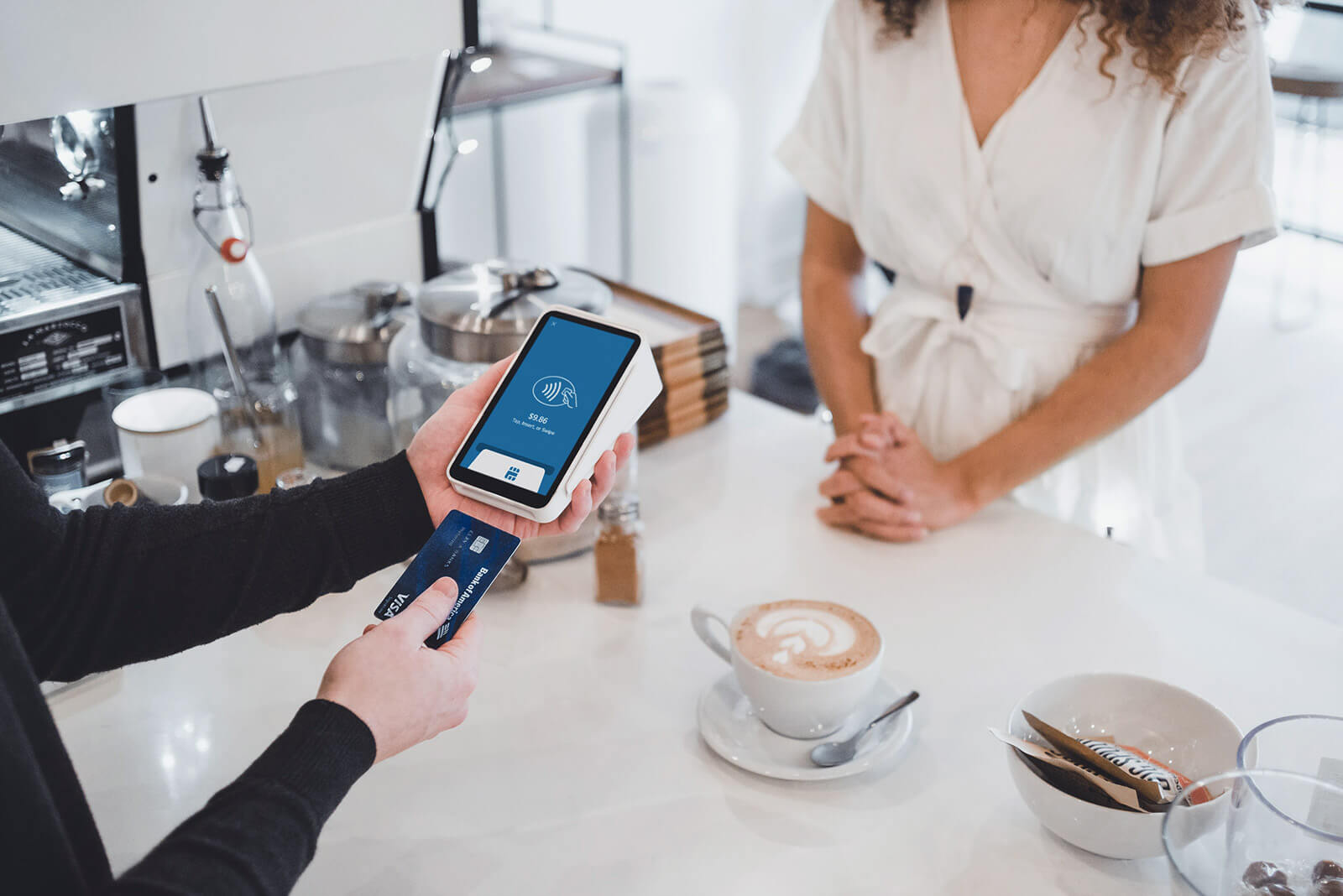 Contactless payment at a cafe checkout
