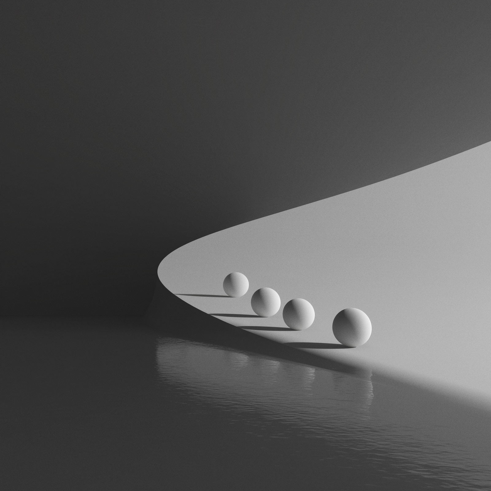 Three white spheres on curved gray slope