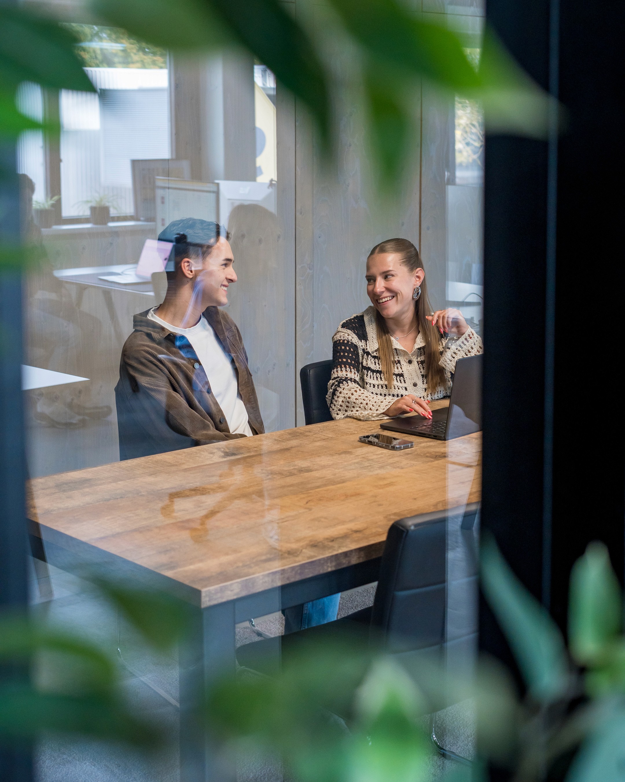 woman scrolling through content on her iphone