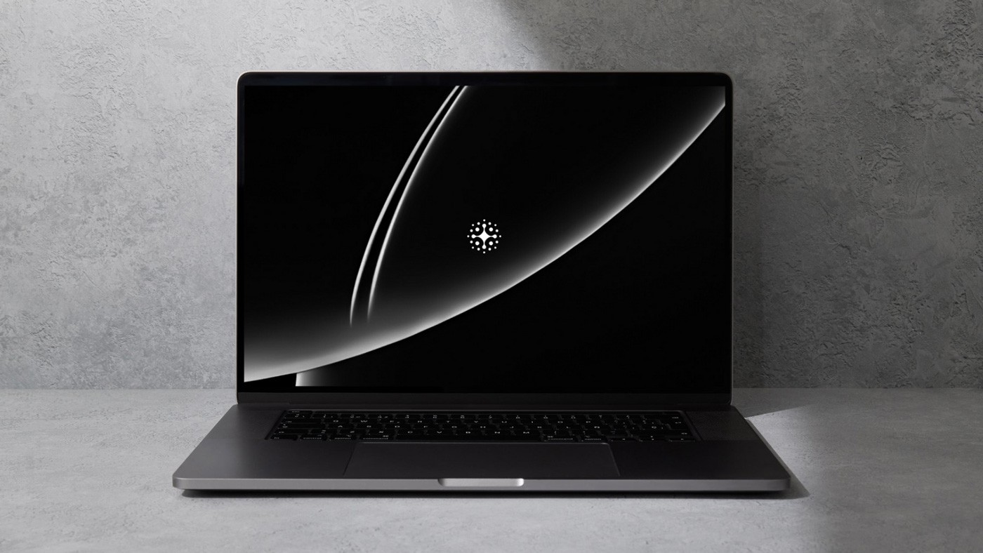 Smart speaker with a glowing top, placed on a circular base in a dark room.