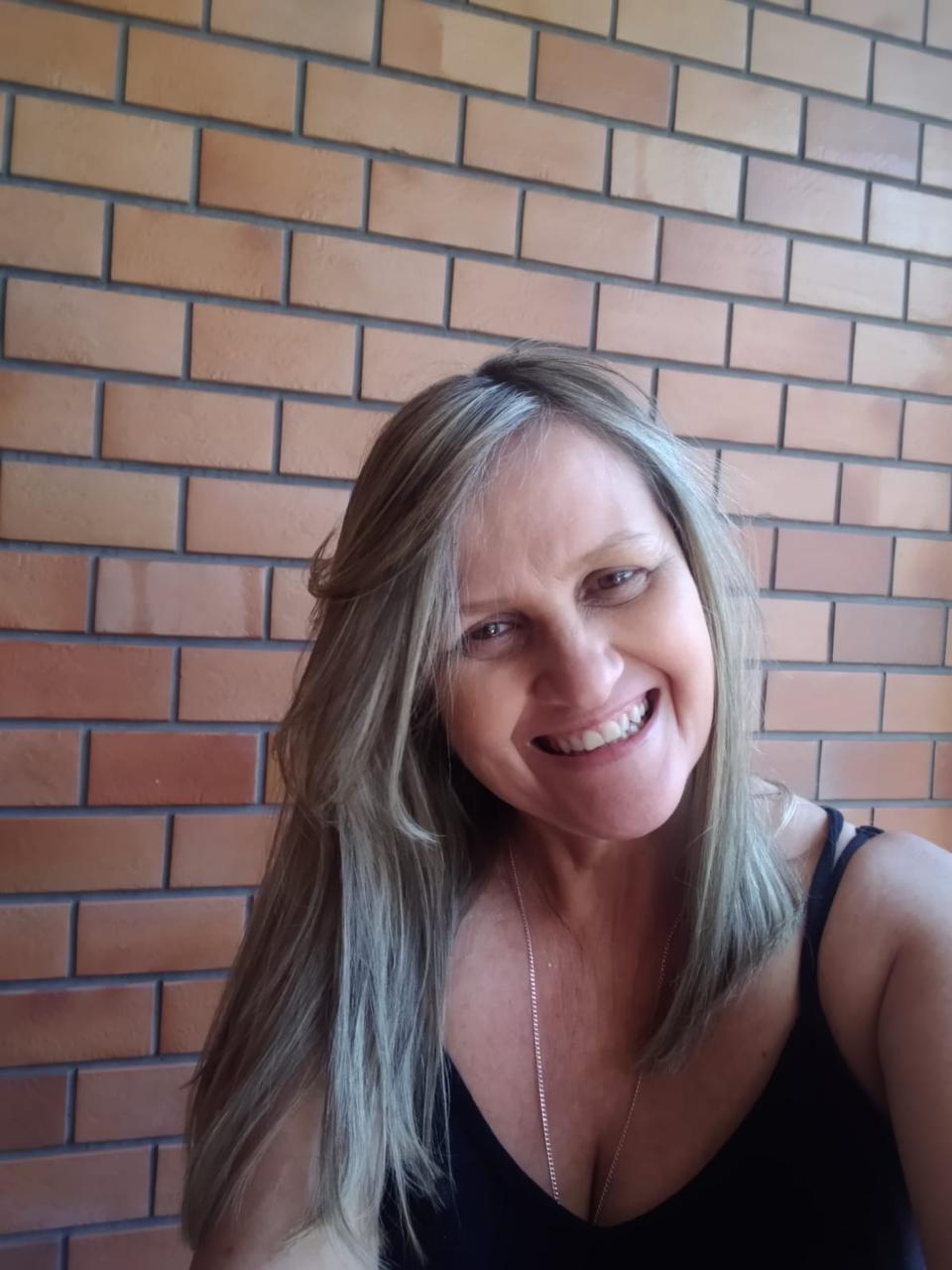 Happy customer giving feedback on her results