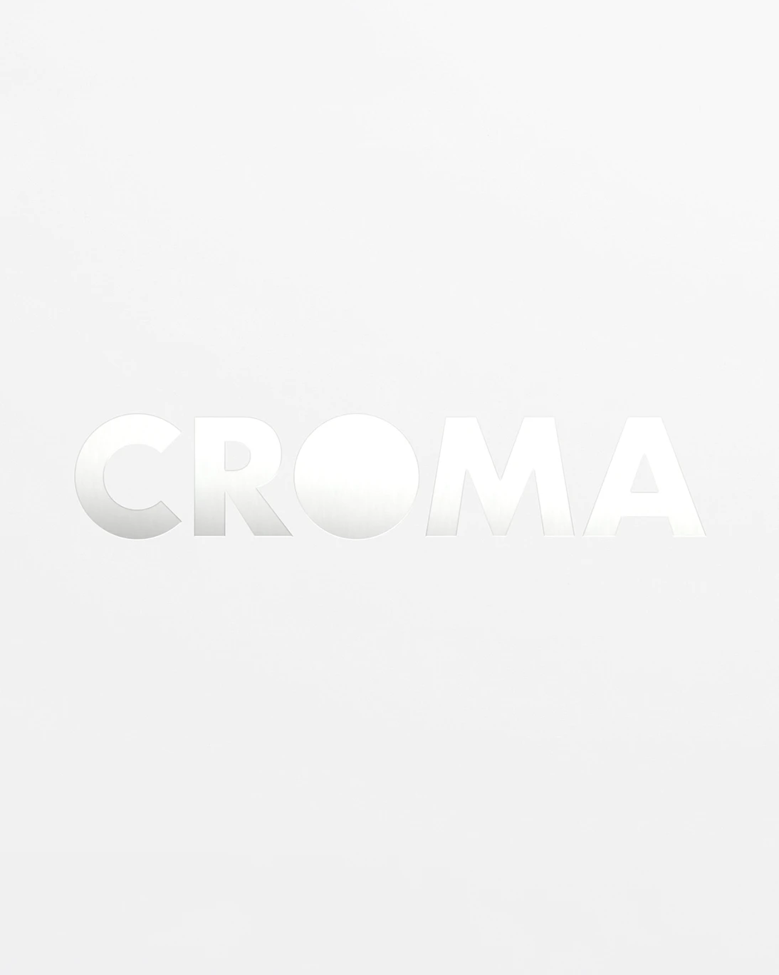 Croma restaurant logotype in white on a light background, brand identity design by Sebastian Saavedra