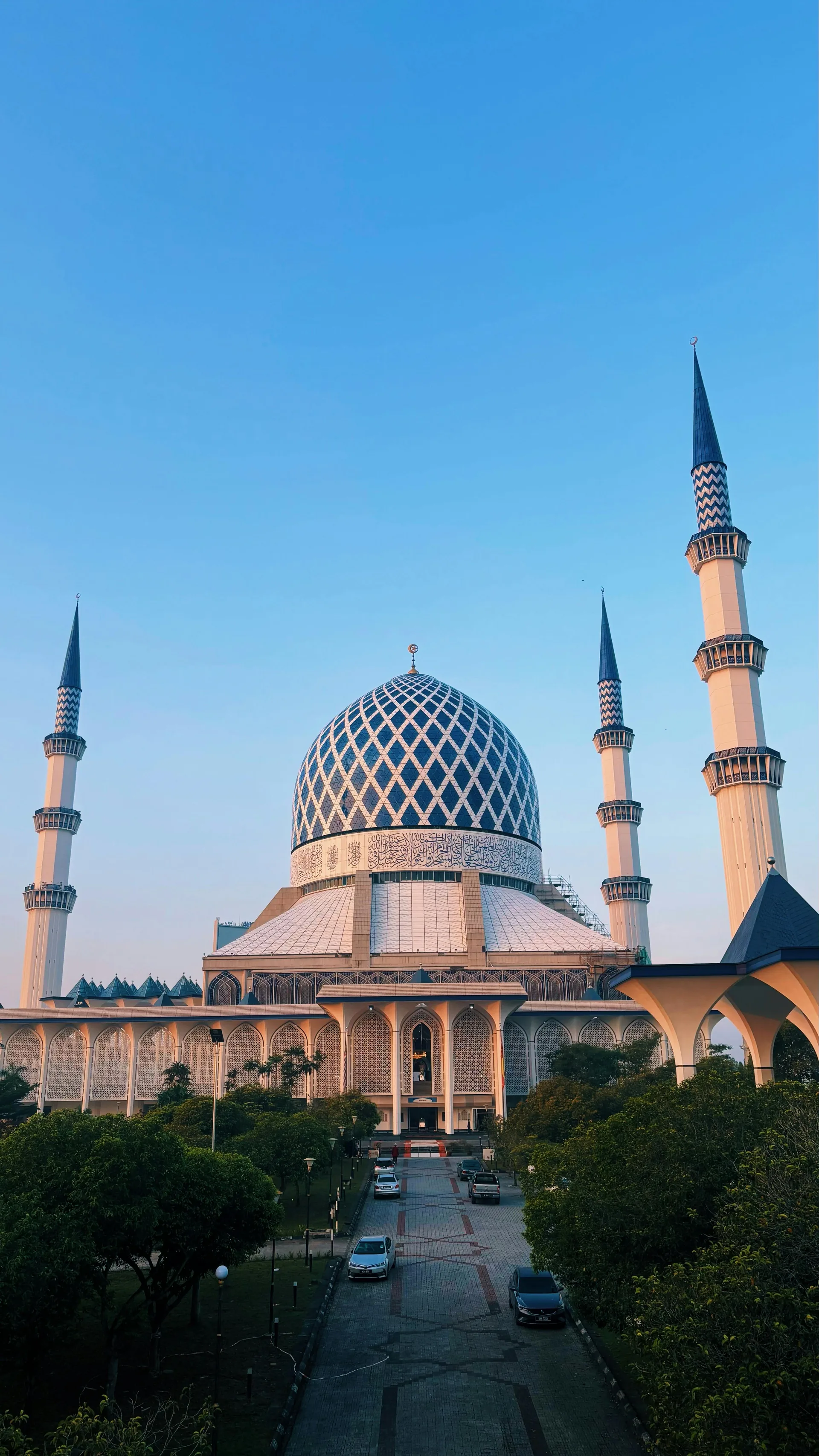 a black and white living room with a large tv