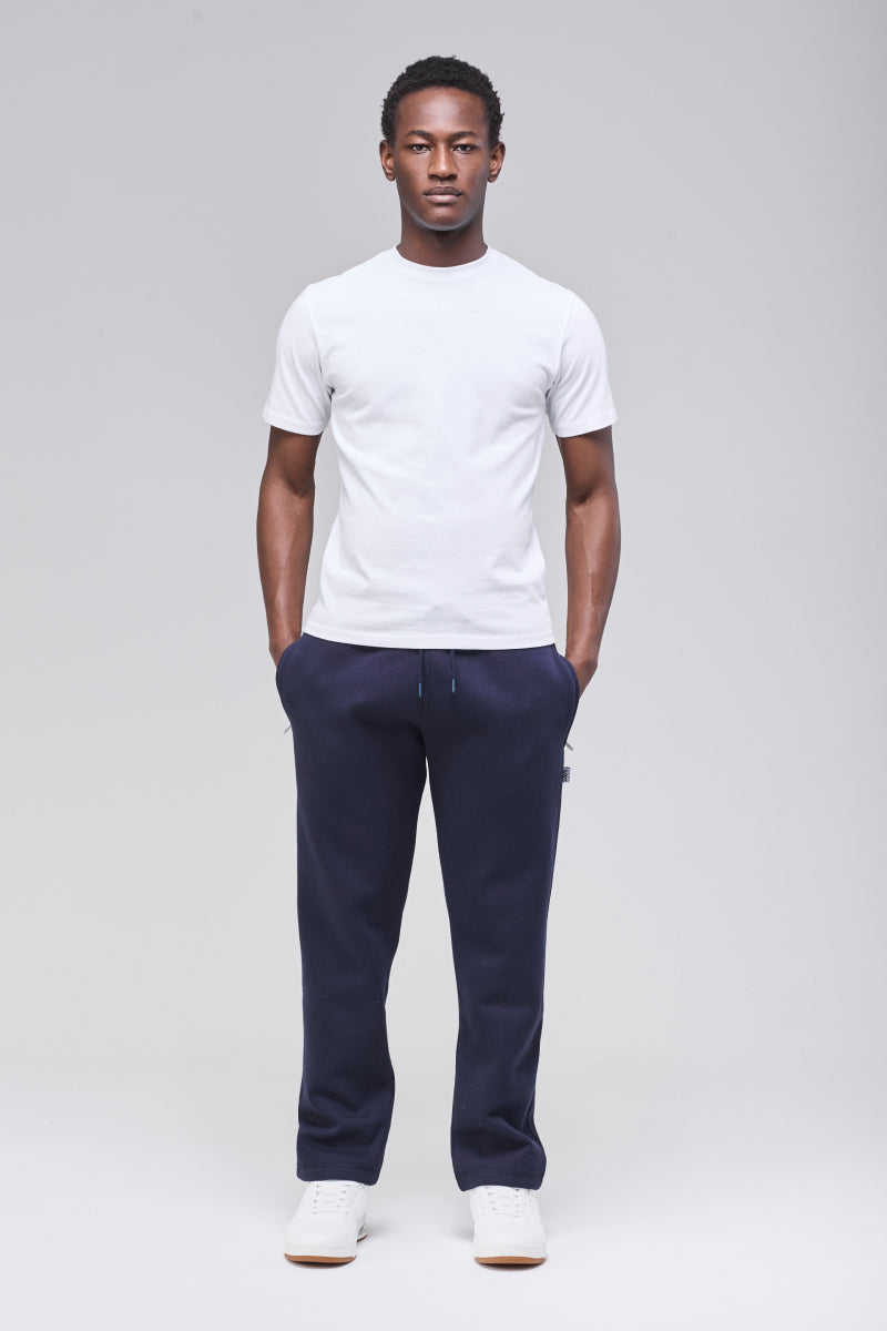 Sunday Superior Langley Sweatpants in rich navy, male model front view