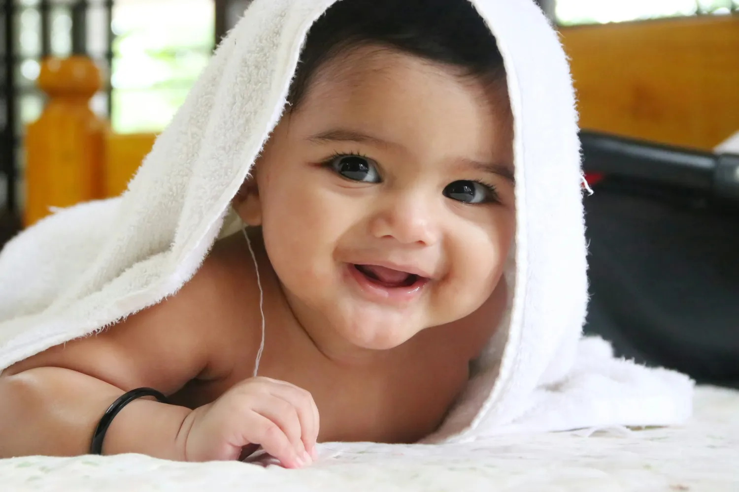 girl-in-white-towel-on-head - nihal-karkala (unsplash)./pho