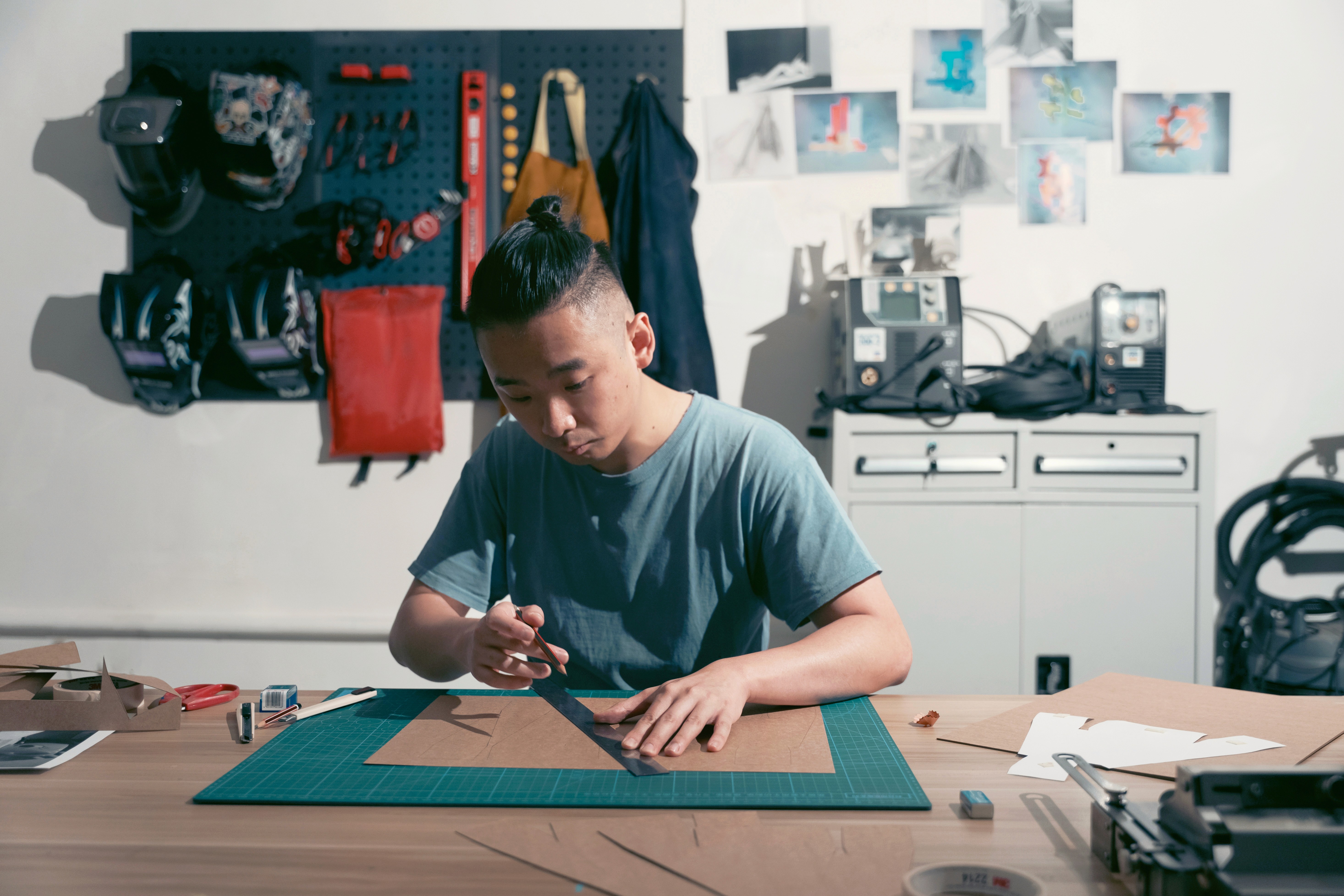 a woman holding a red flower