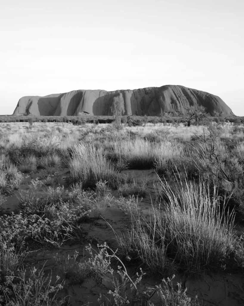 Uluru private jet hire - Ayers Rock sandstone formation ancient mysticism
