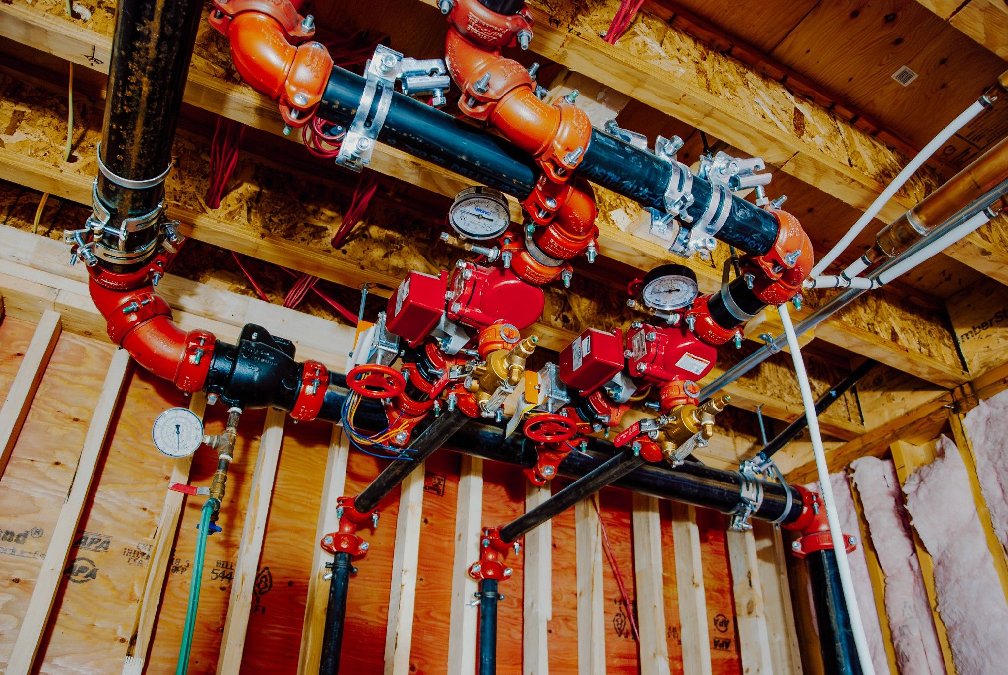 Pipes and valves for plumbing and HVAC system in Chilliwack, Fraser Valley, British Columbia installation.