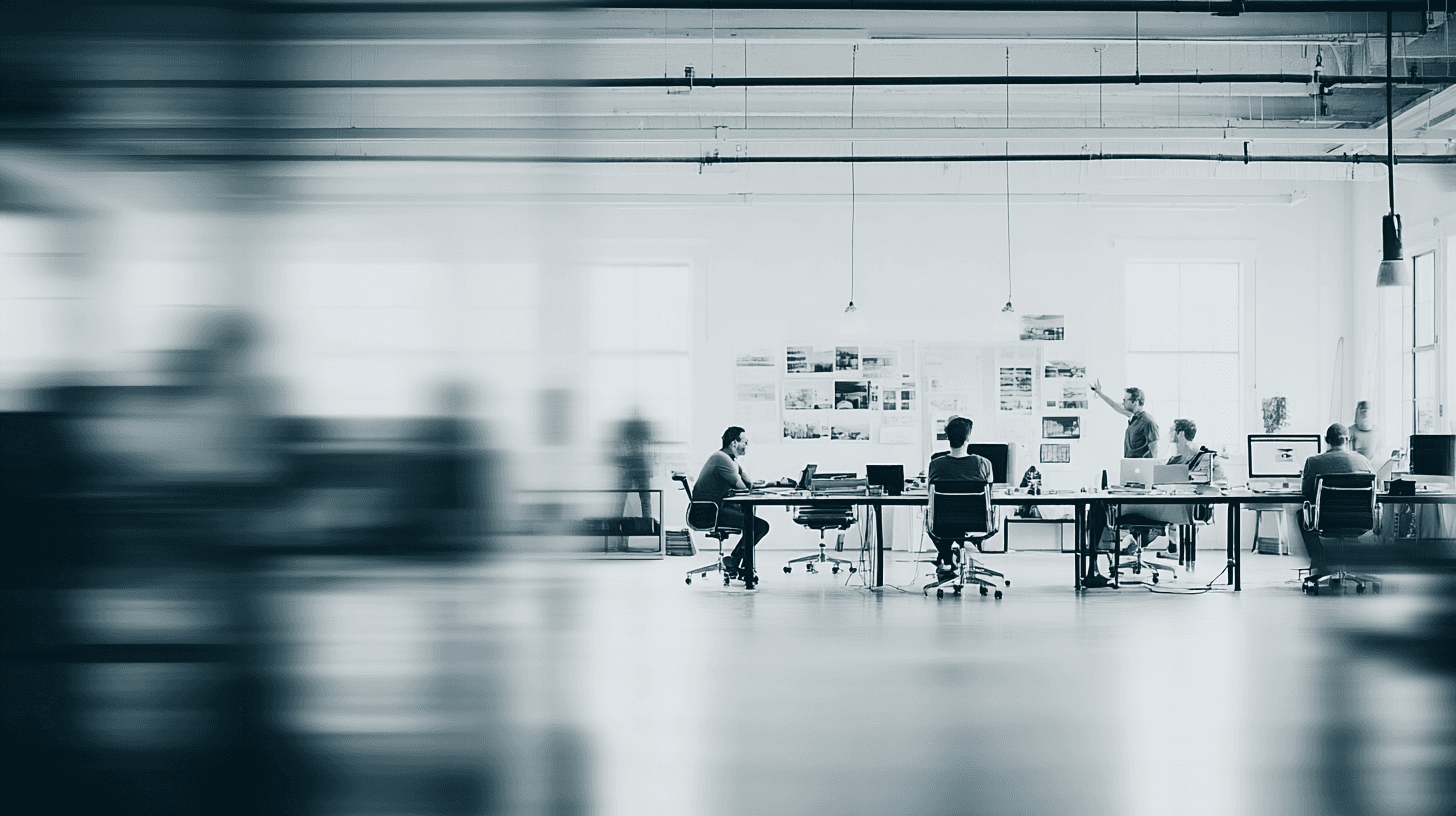 Smiling young woman with long hair standing against a dark green background, holding a finger to her chin.