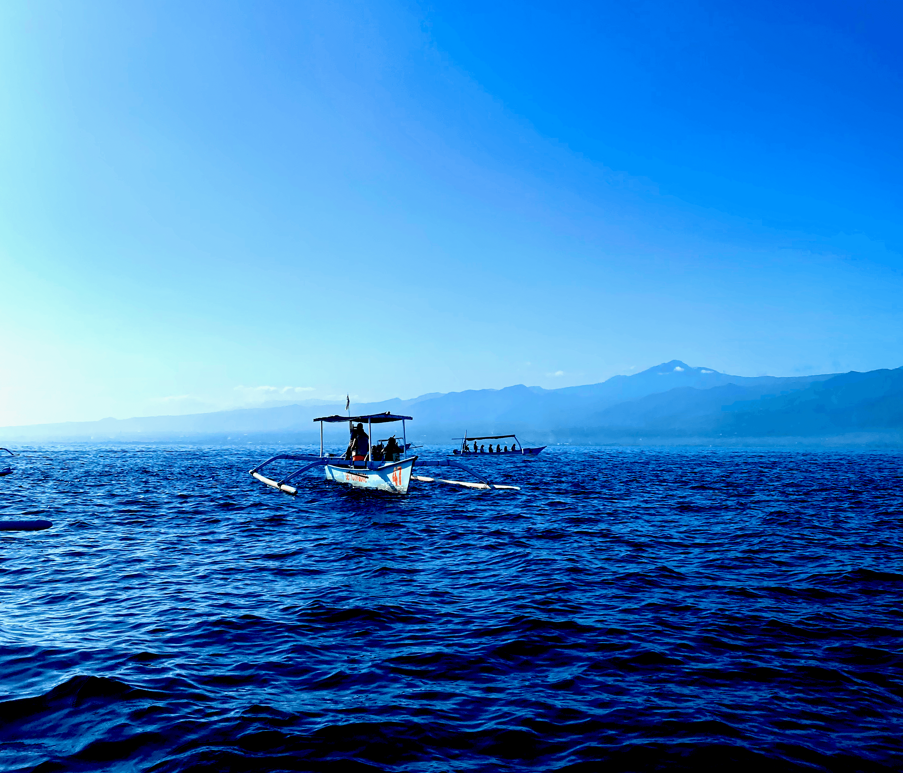 Woman walking along a race track