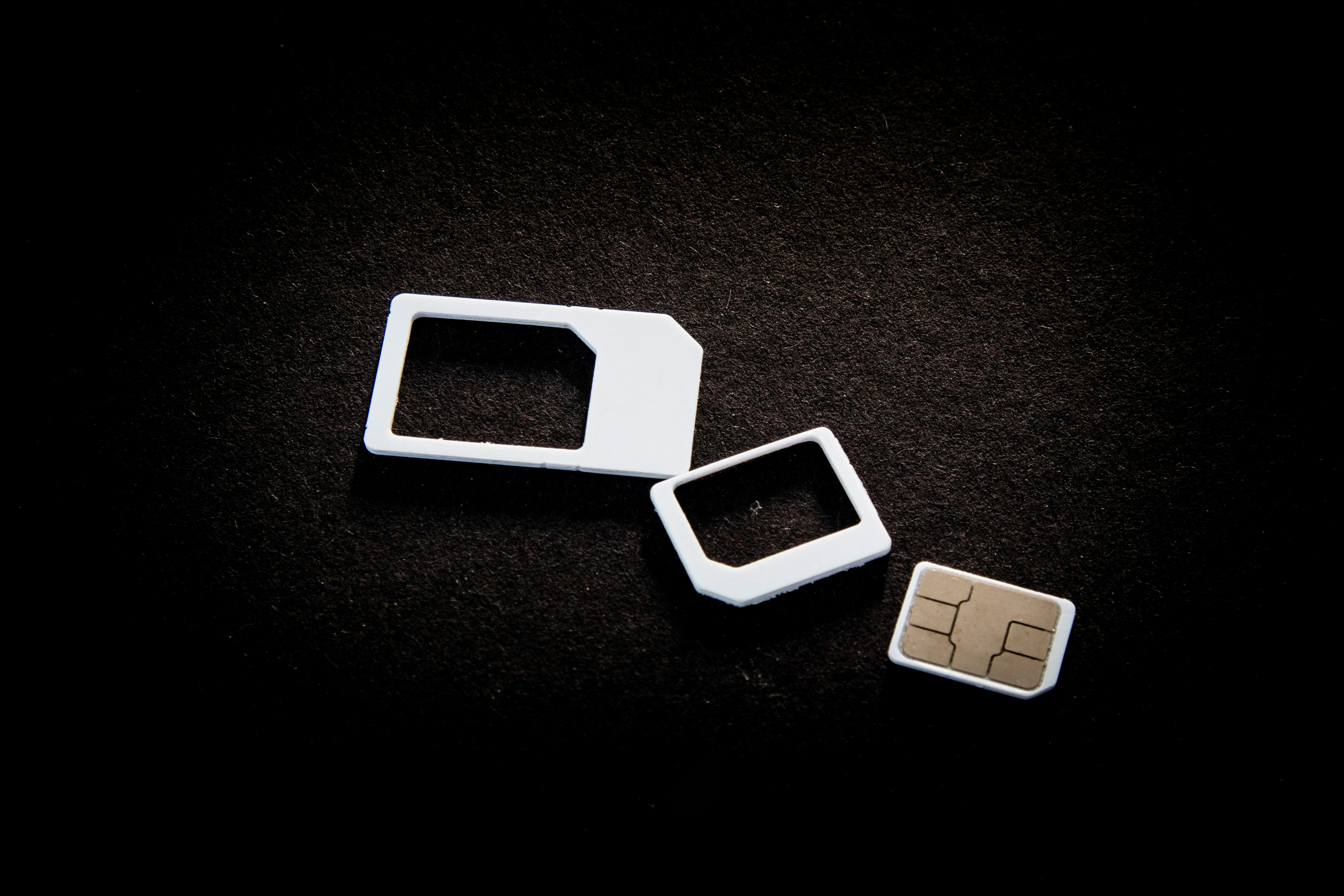 Sim cards and their adaptors are on display.