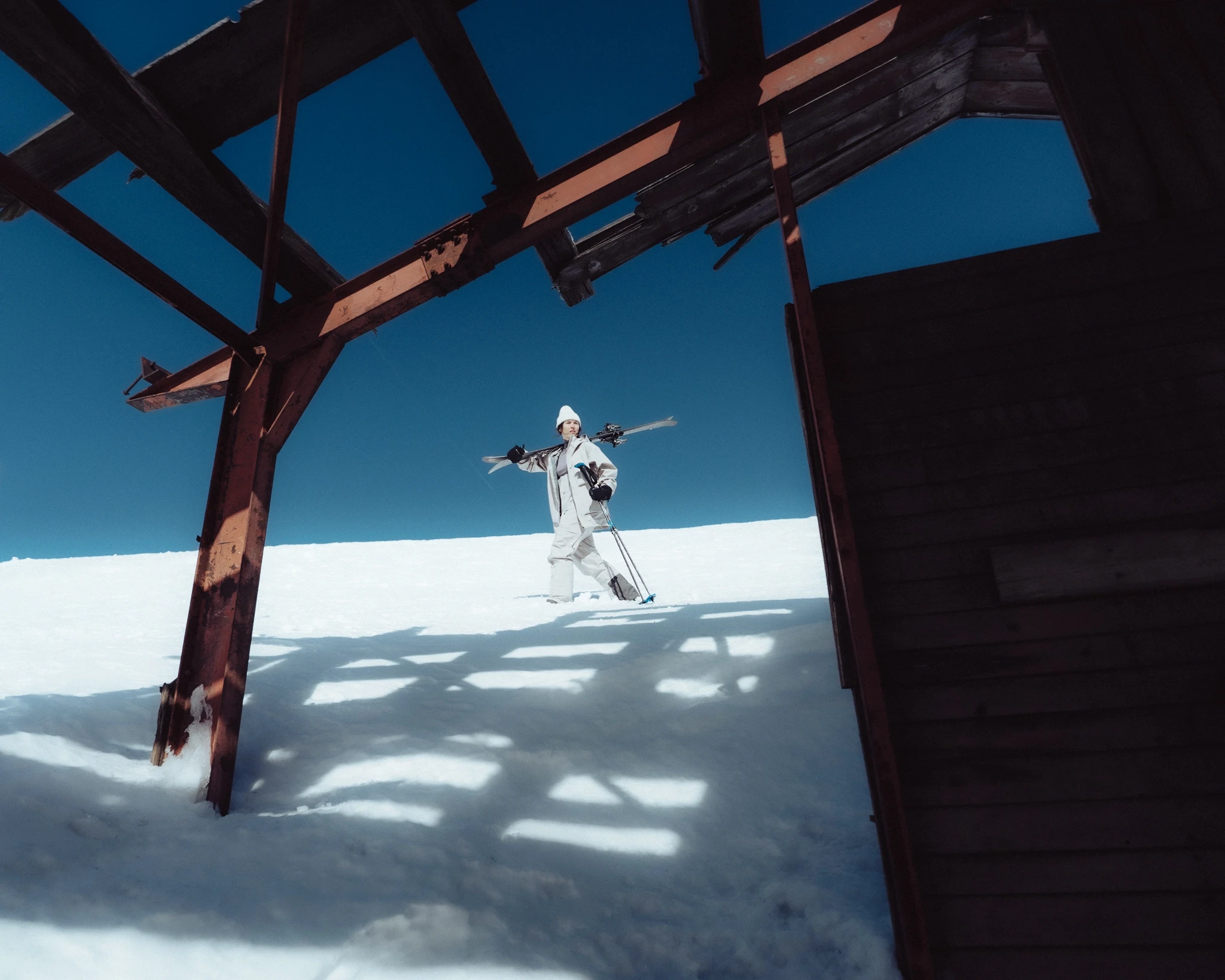 skier going down the slope with skis.