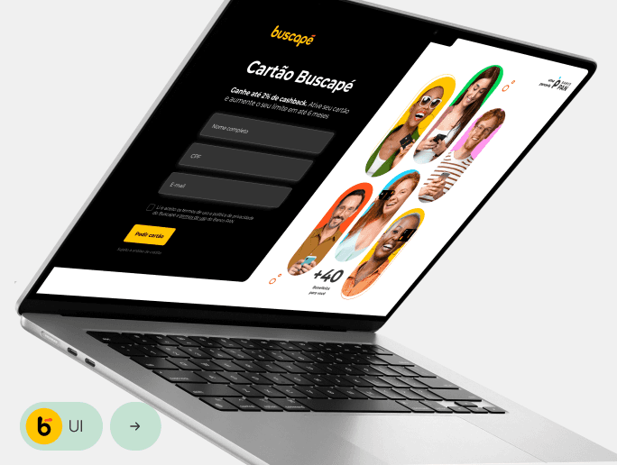 Laptop exibe a página do cartão Buscapé, com design moderno e intuitivo. Apresenta um formulário para solicitação do cartão e imagens de pessoas utilizando os benefícios.