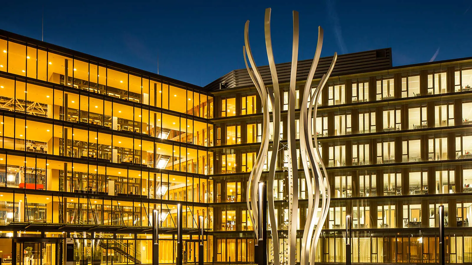 a building with trees and plants