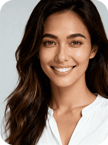Natural female portrait in white shirt, neutral background with soft daylight