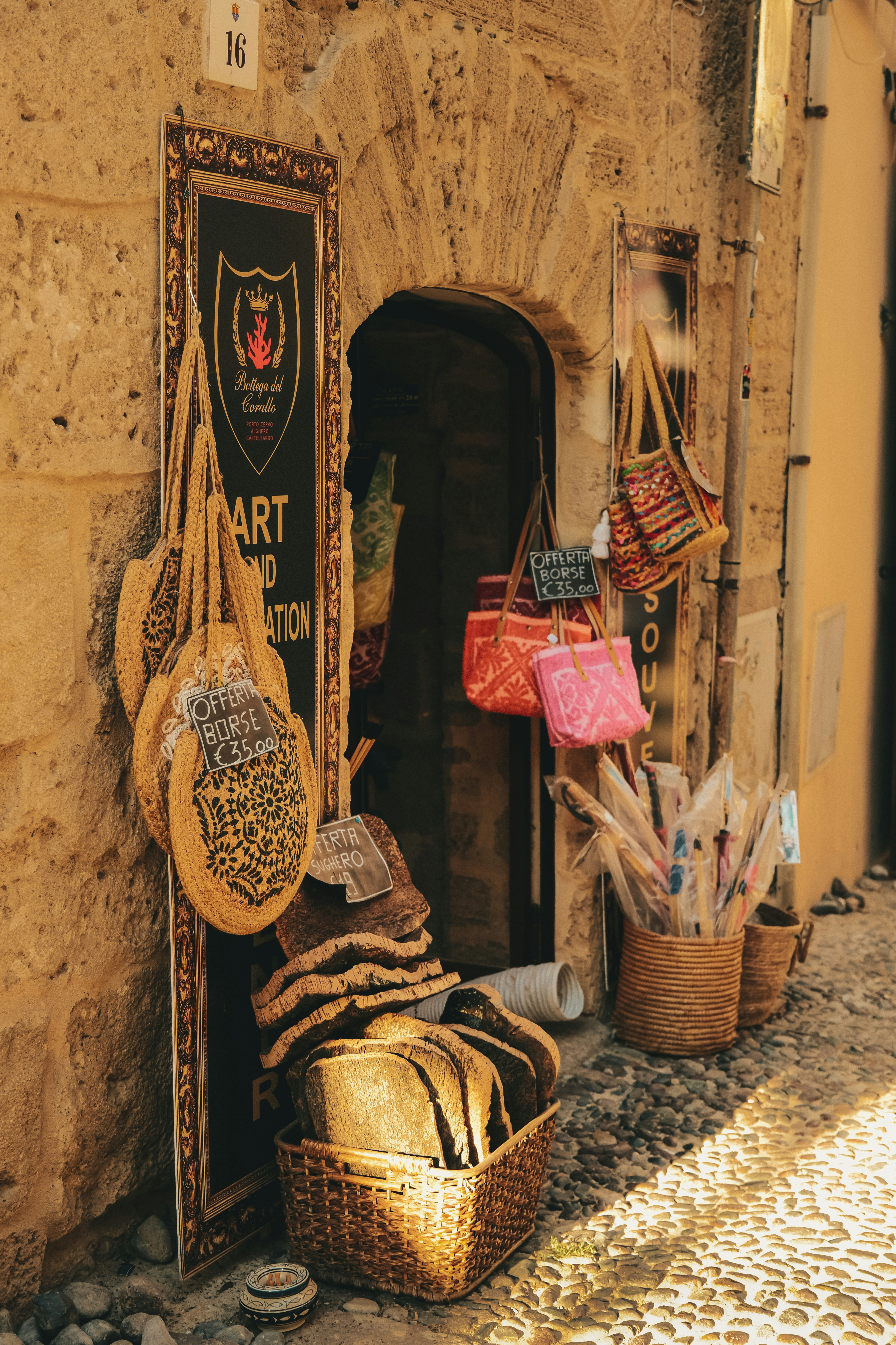 Shop entrance with bags and woven items displayed outside
